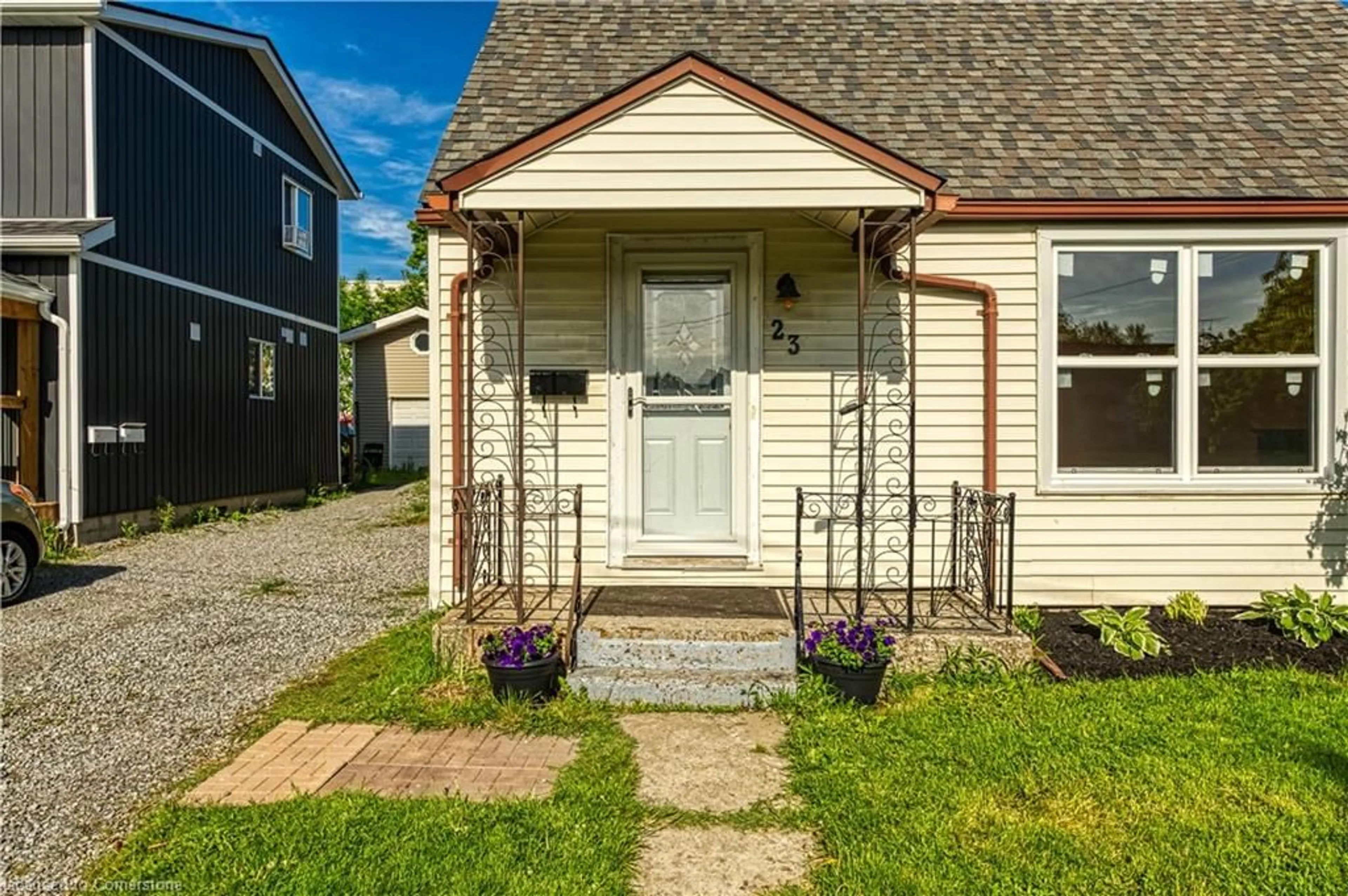 Home with vinyl exterior material, street for 23 Philip St, St. Catharines Ontario L2P 2M7