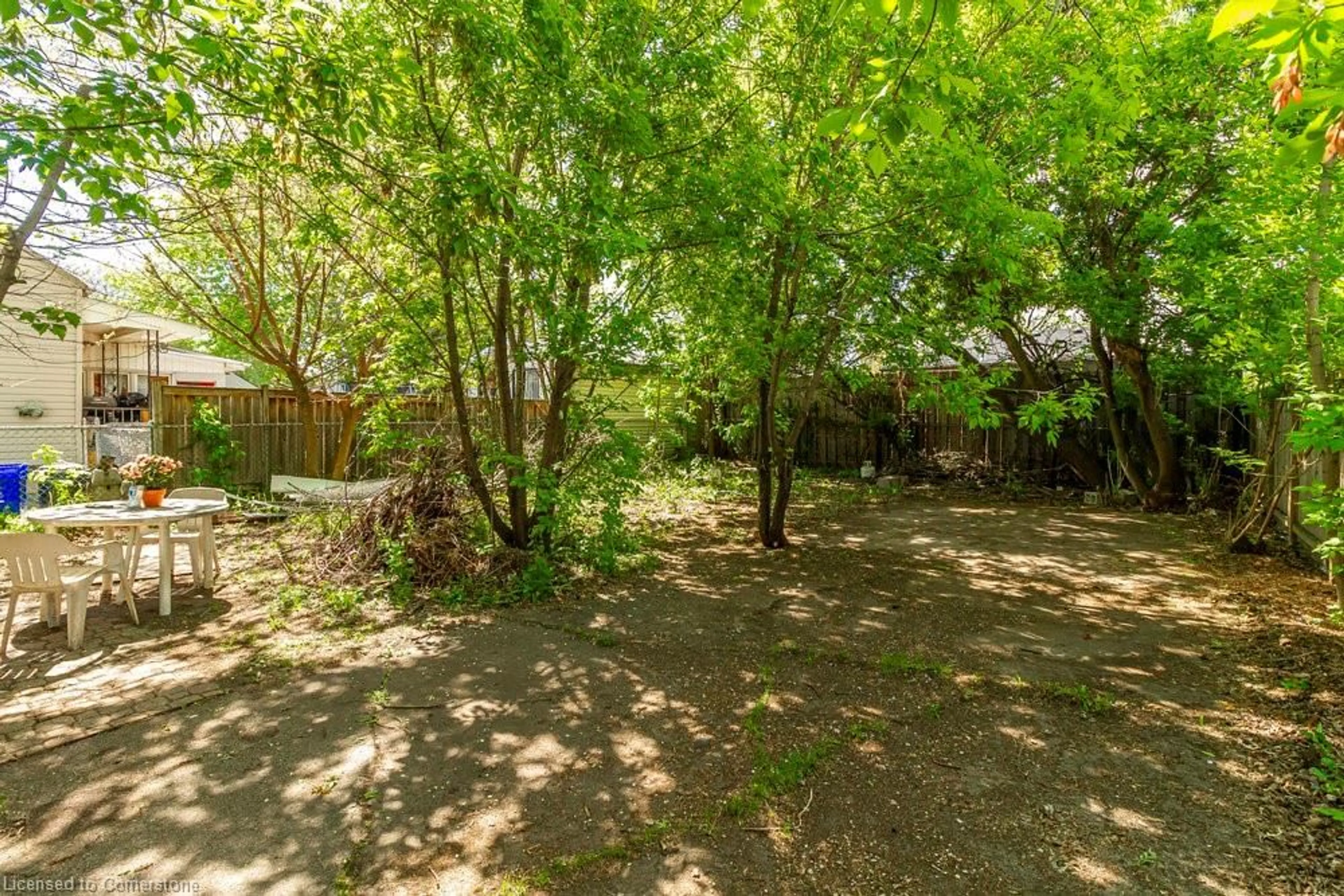 Patio, forest/trees view for 20 Goggin Ave, Hamilton Ontario L8H 3C1
