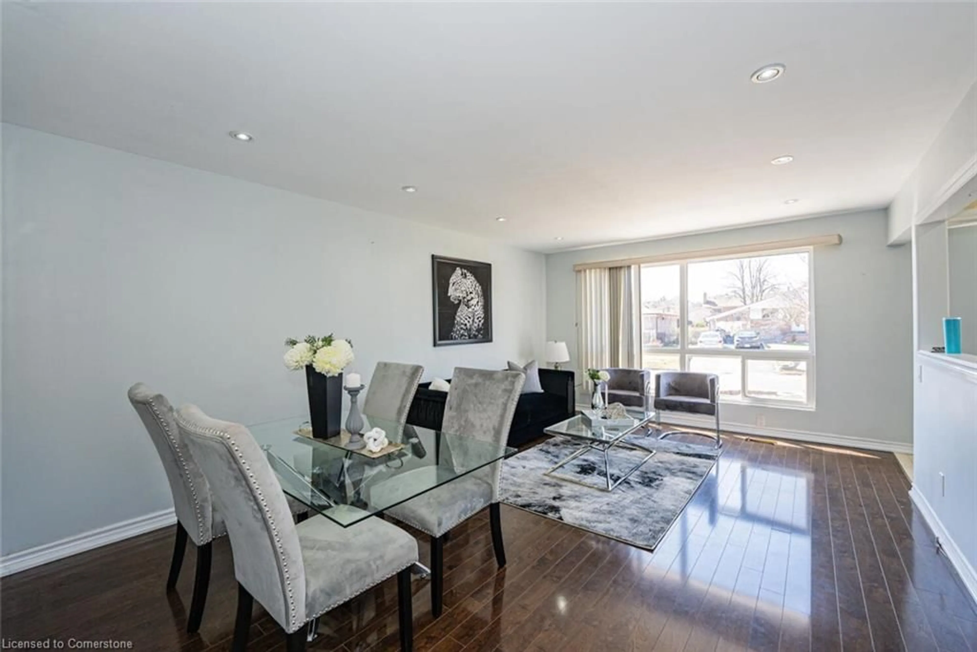 Living room with furniture, wood/laminate floor for 18 Northwood Dr, Peel Ontario L6X 2L2