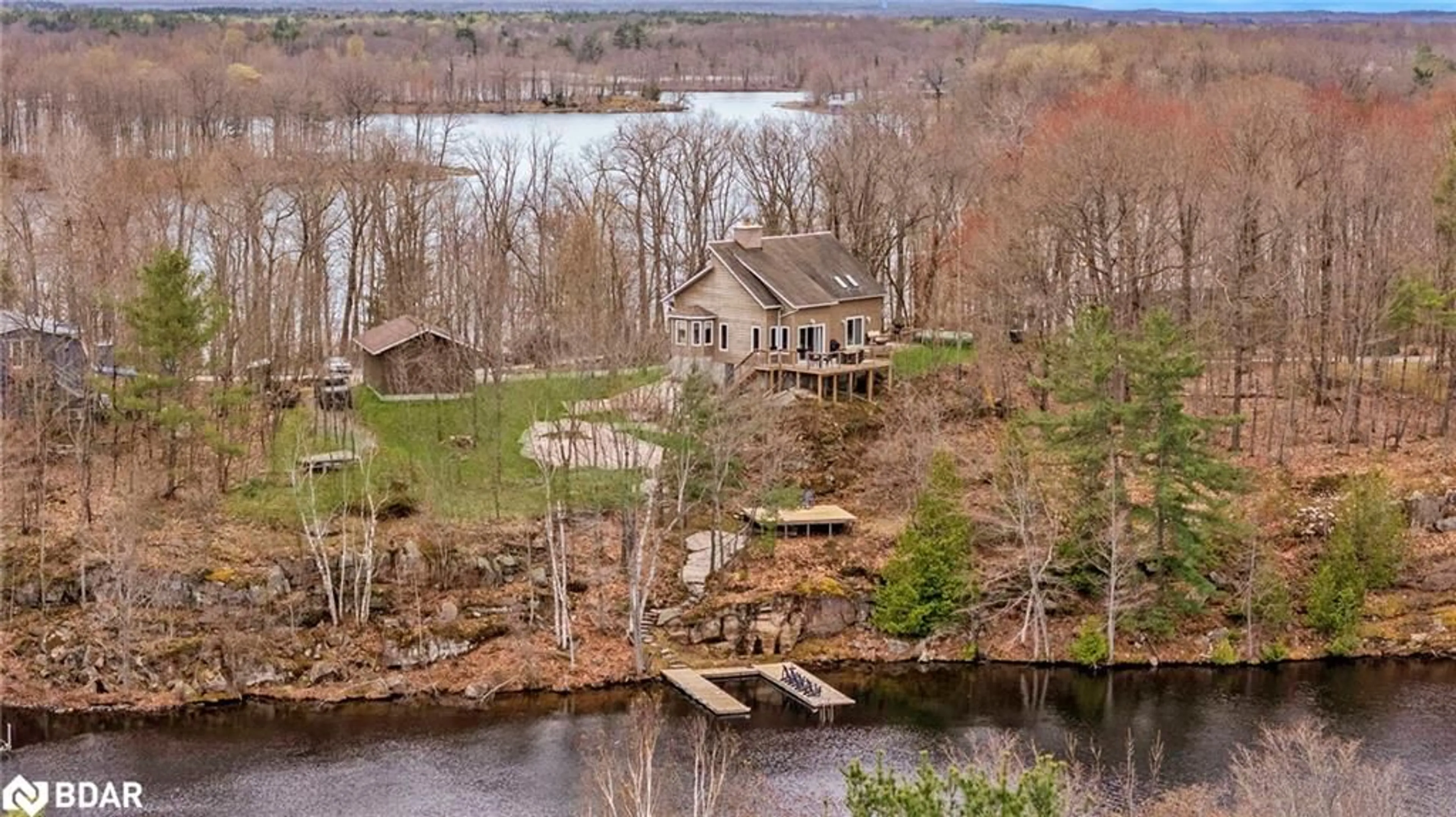 A pic from outside/outdoor area/front of a property/back of a property/a pic from drone, water/lake/river/ocean view for 2043 Beman Point Lane, Coldwater Ontario L0K 1E0