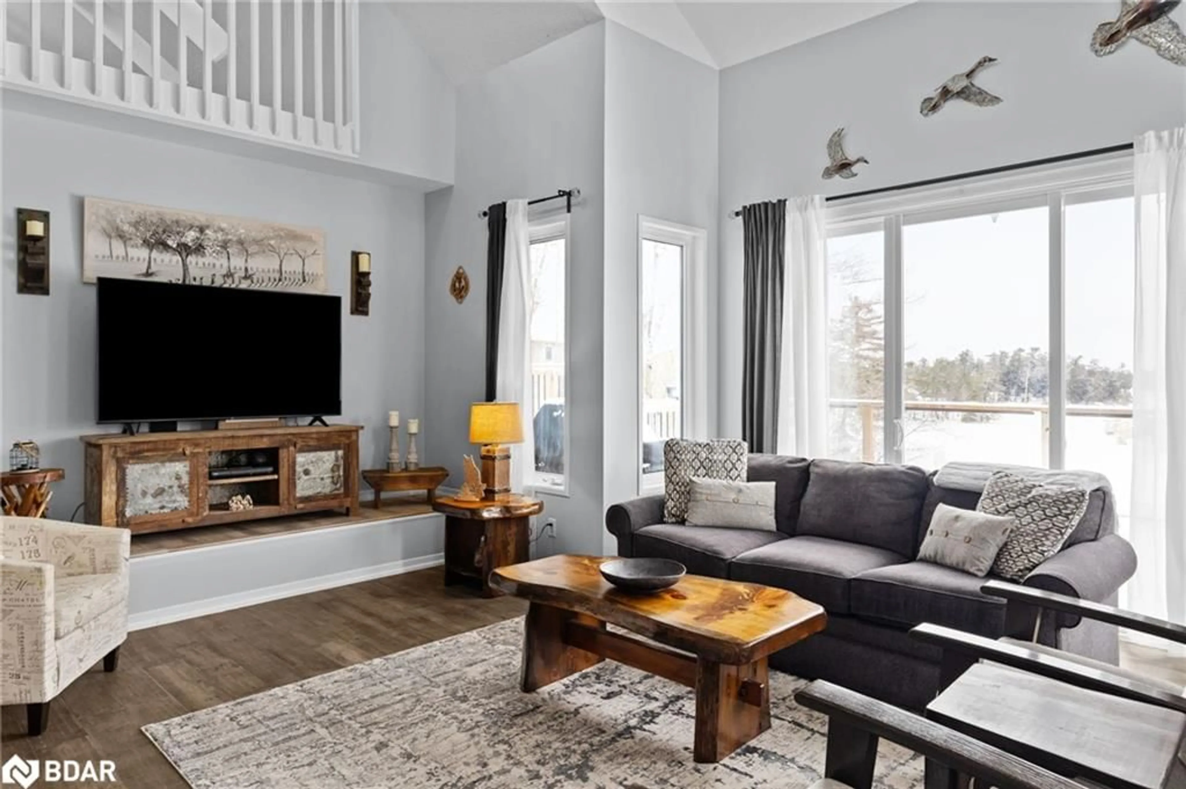 Living room with furniture, unknown for 2043 Beman Point Lane, Coldwater Ontario L0K 1E0