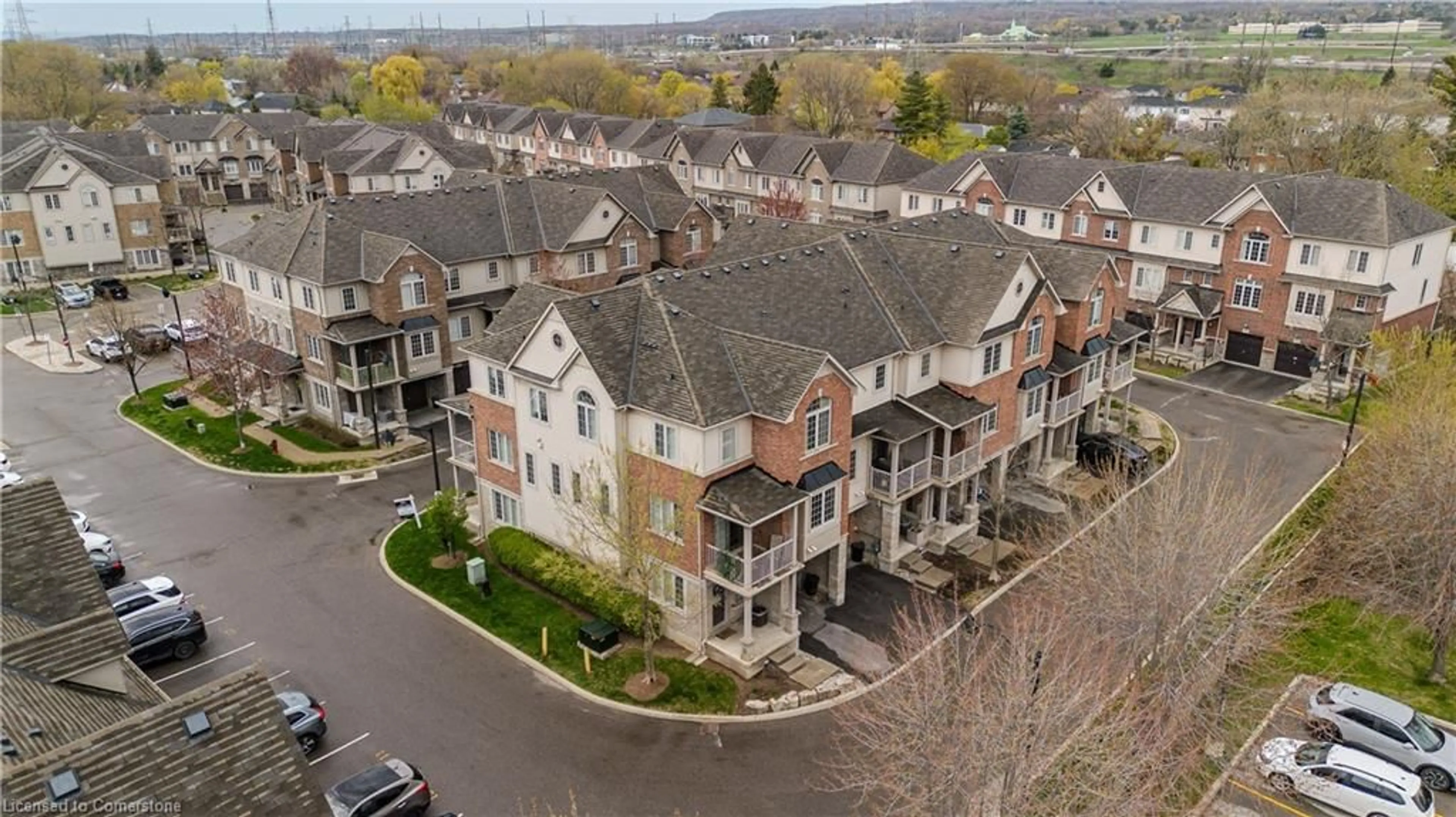 A pic from outside/outdoor area/front of a property/back of a property/a pic from drone, city buildings view from balcony for 1401 Plains Rd #112, Burlington Ontario L7R 0C2