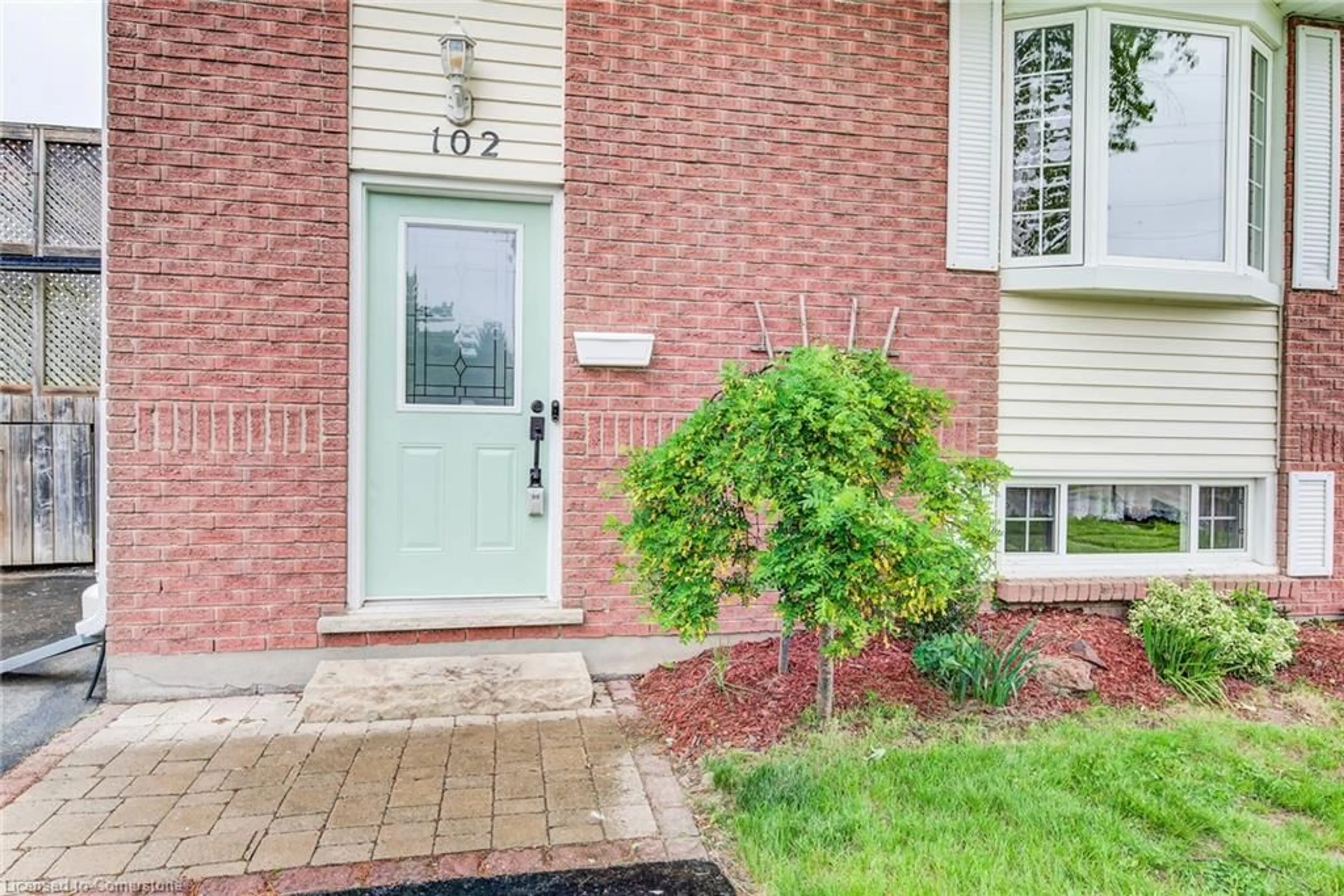Home with brick exterior material, street for 102 Sugar Maple St, Kitchener Ontario N2N 1X7