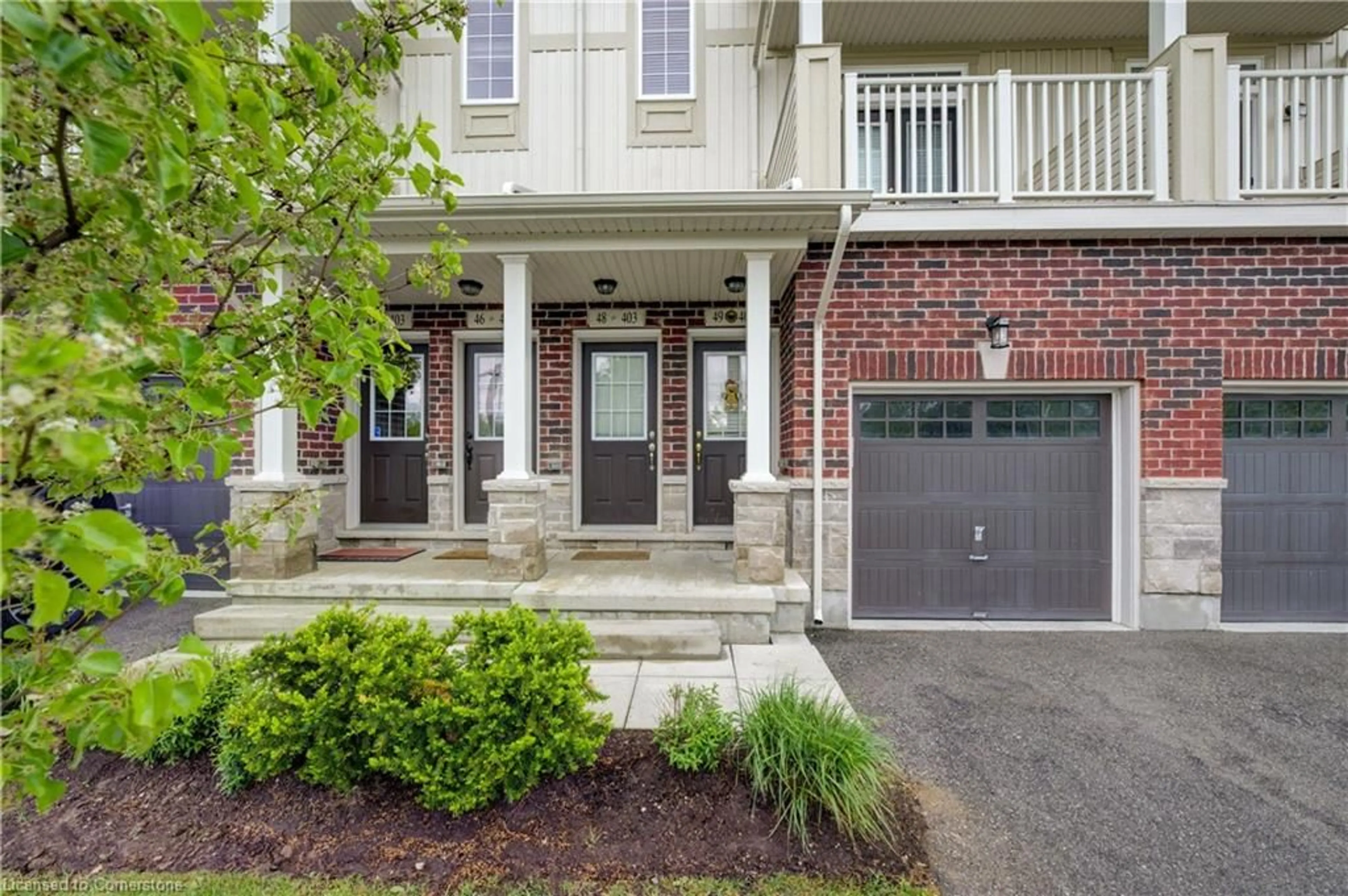 Home with brick exterior material, street for 403 Westwood Dr #49, Kitchener Ontario N2M 0B5