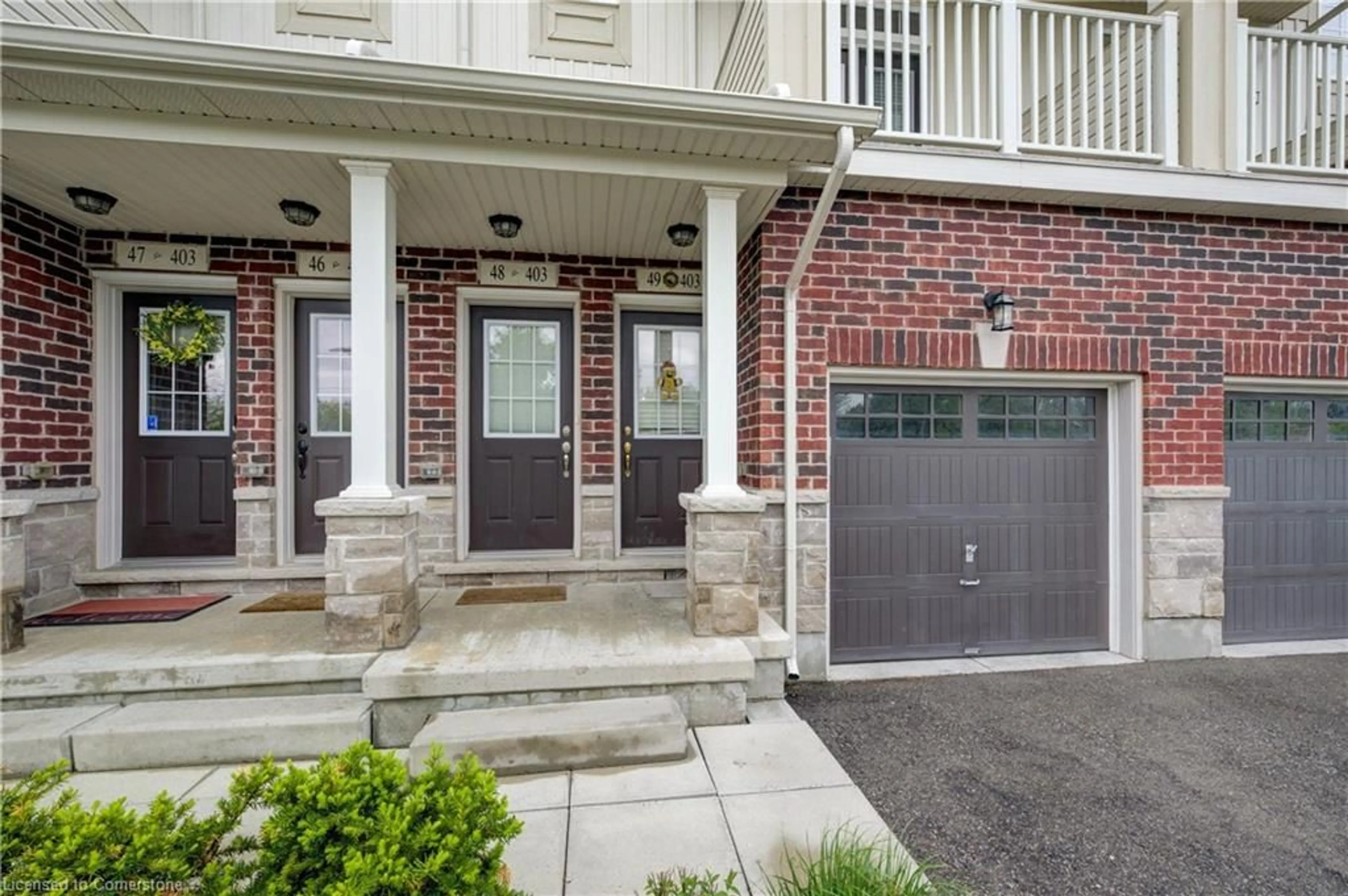 Home with brick exterior material, street for 403 Westwood Dr #49, Kitchener Ontario N2M 0B5