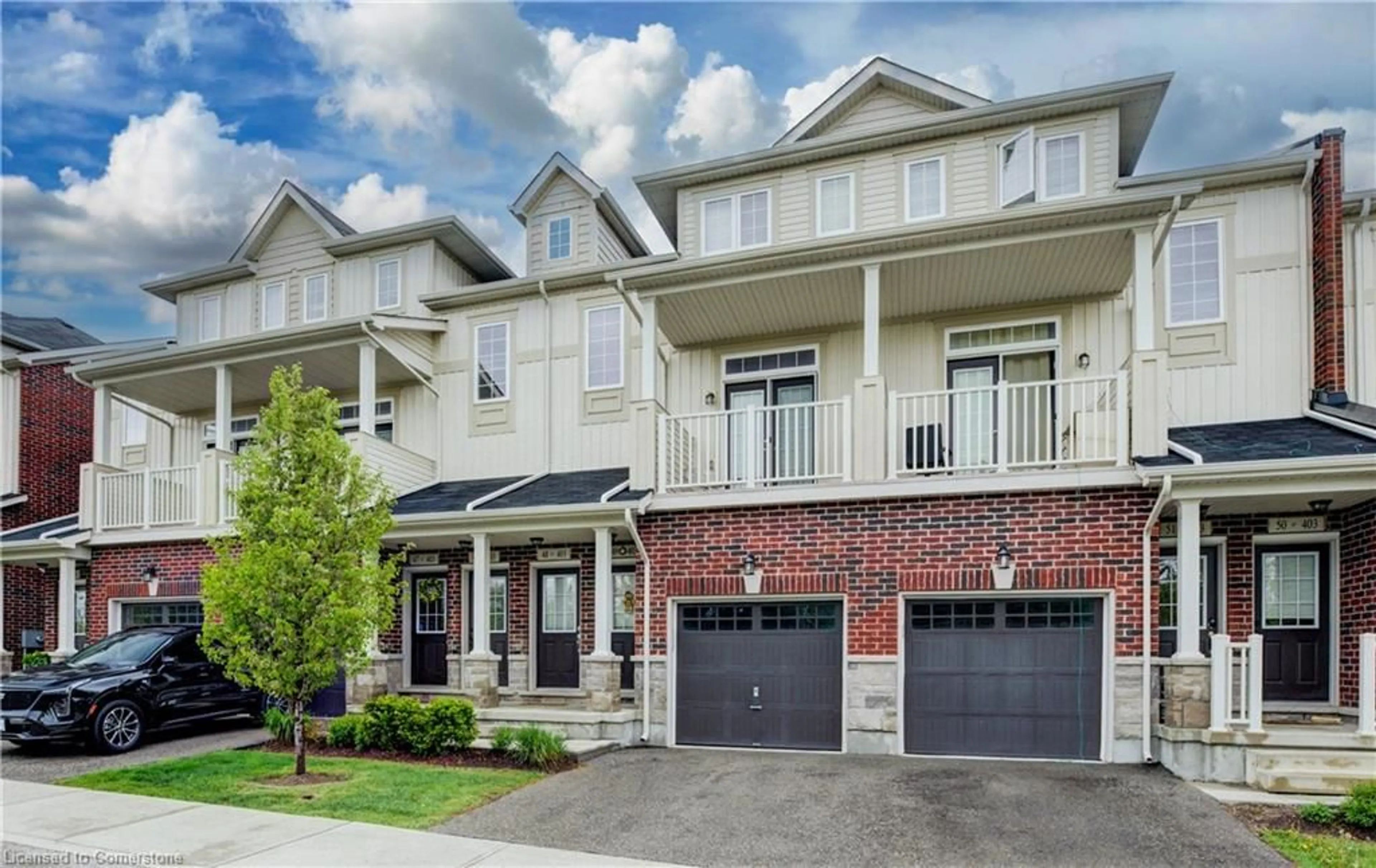 Home with brick exterior material, street for 403 Westwood Dr #49, Kitchener Ontario N2M 0B5