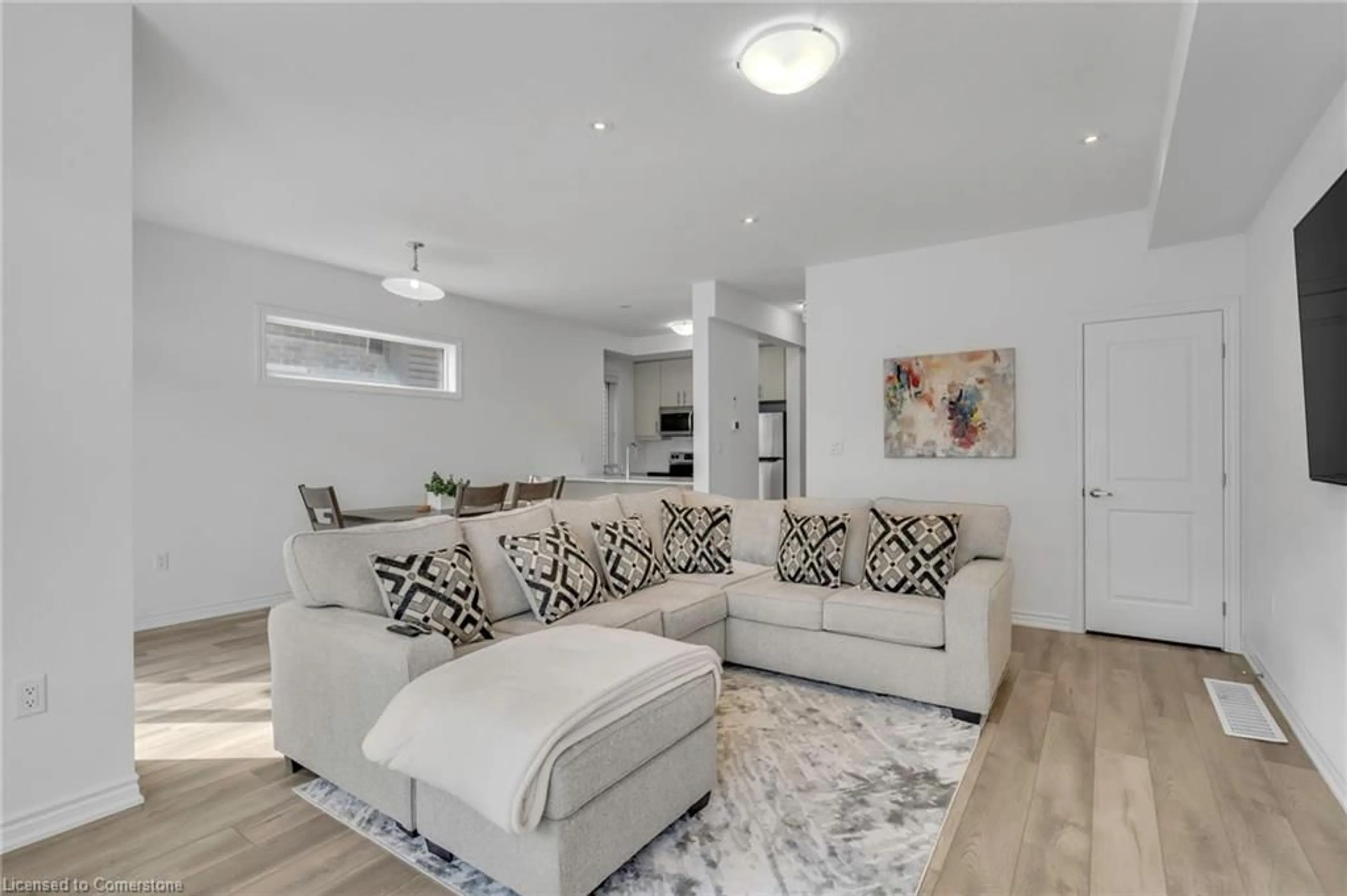 Living room with furniture, unknown for 5000 Connor Dr #4, Beamsville Ontario L3J 0S2