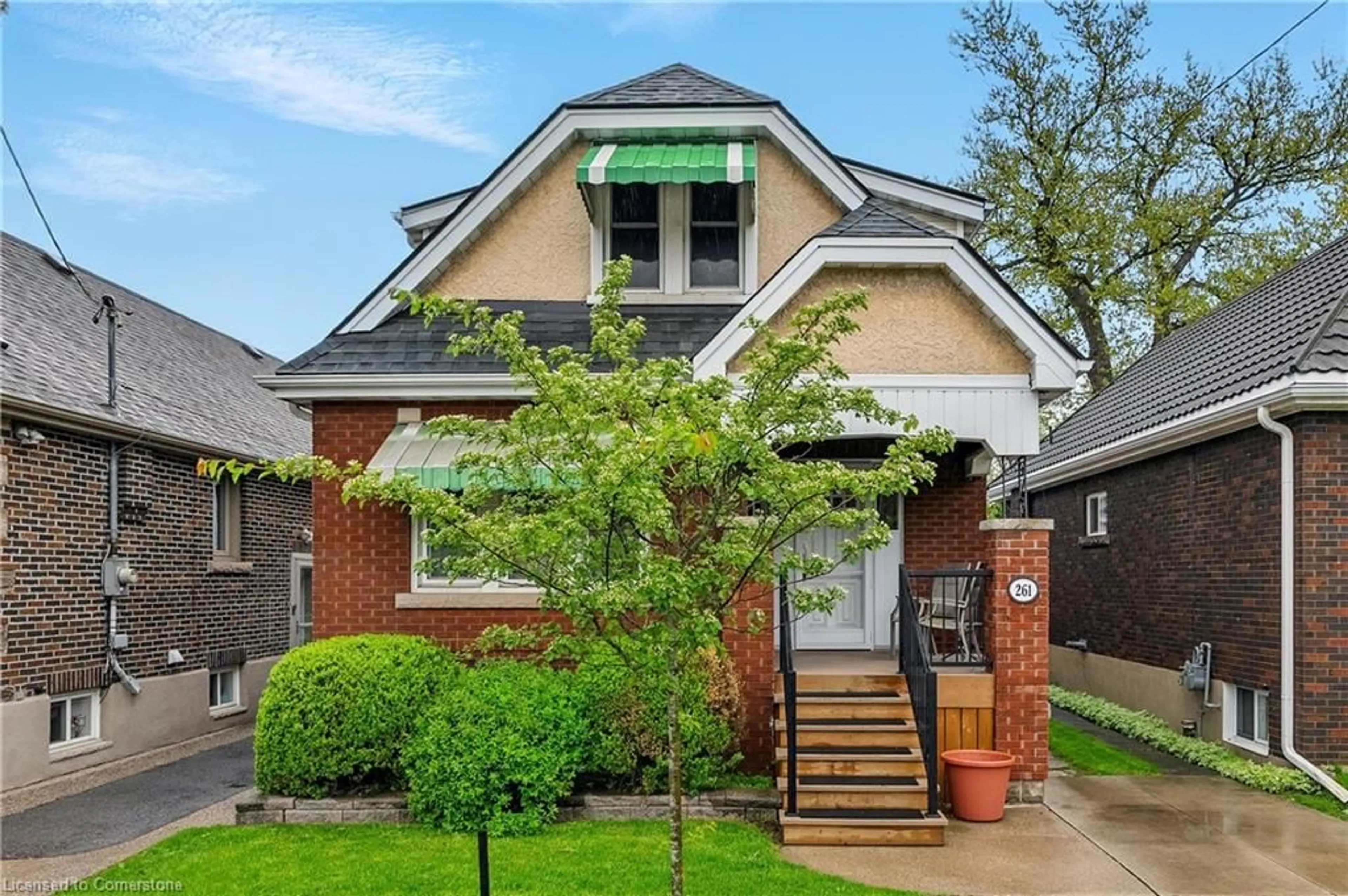 Home with brick exterior material, street for 261 Wexford Ave, Hamilton Ontario L8K 2P4