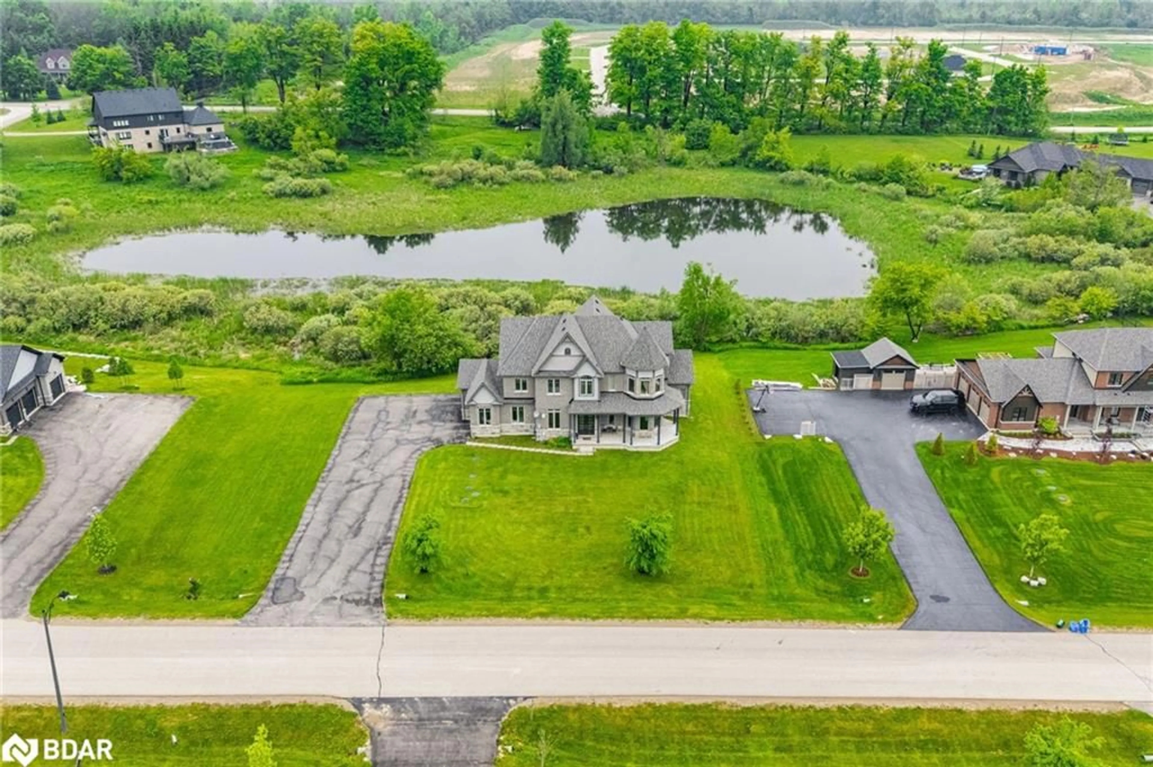 A pic from outside/outdoor area/front of a property/back of a property/a pic from drone, water/lake/river/ocean view for 7 Country Meadows Drive Dr, Amaranth Ontario L9V 3T8
