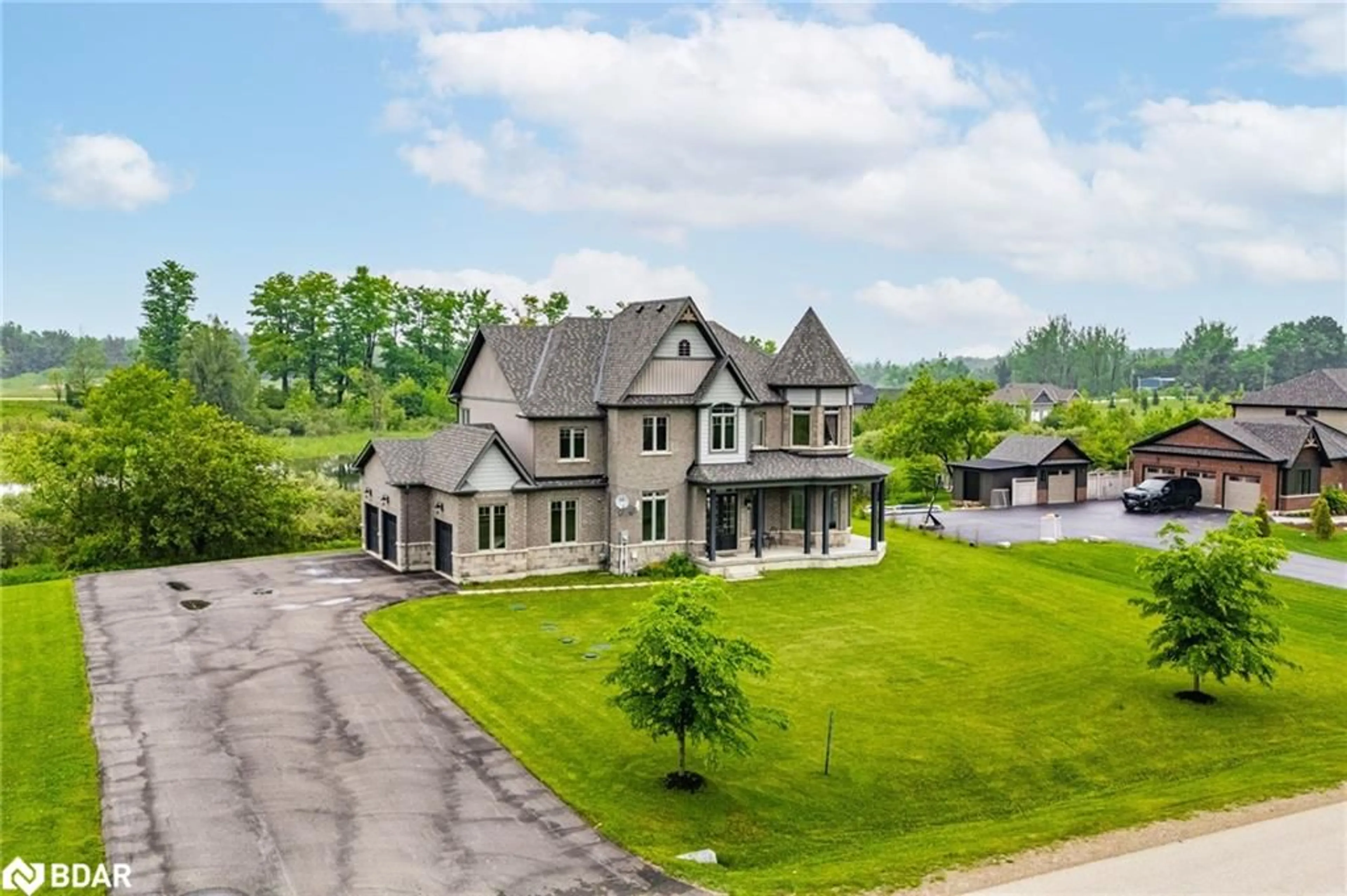 A pic from outside/outdoor area/front of a property/back of a property/a pic from drone, unknown for 7 Country Meadows Drive Dr, Amaranth Ontario L9V 3T8