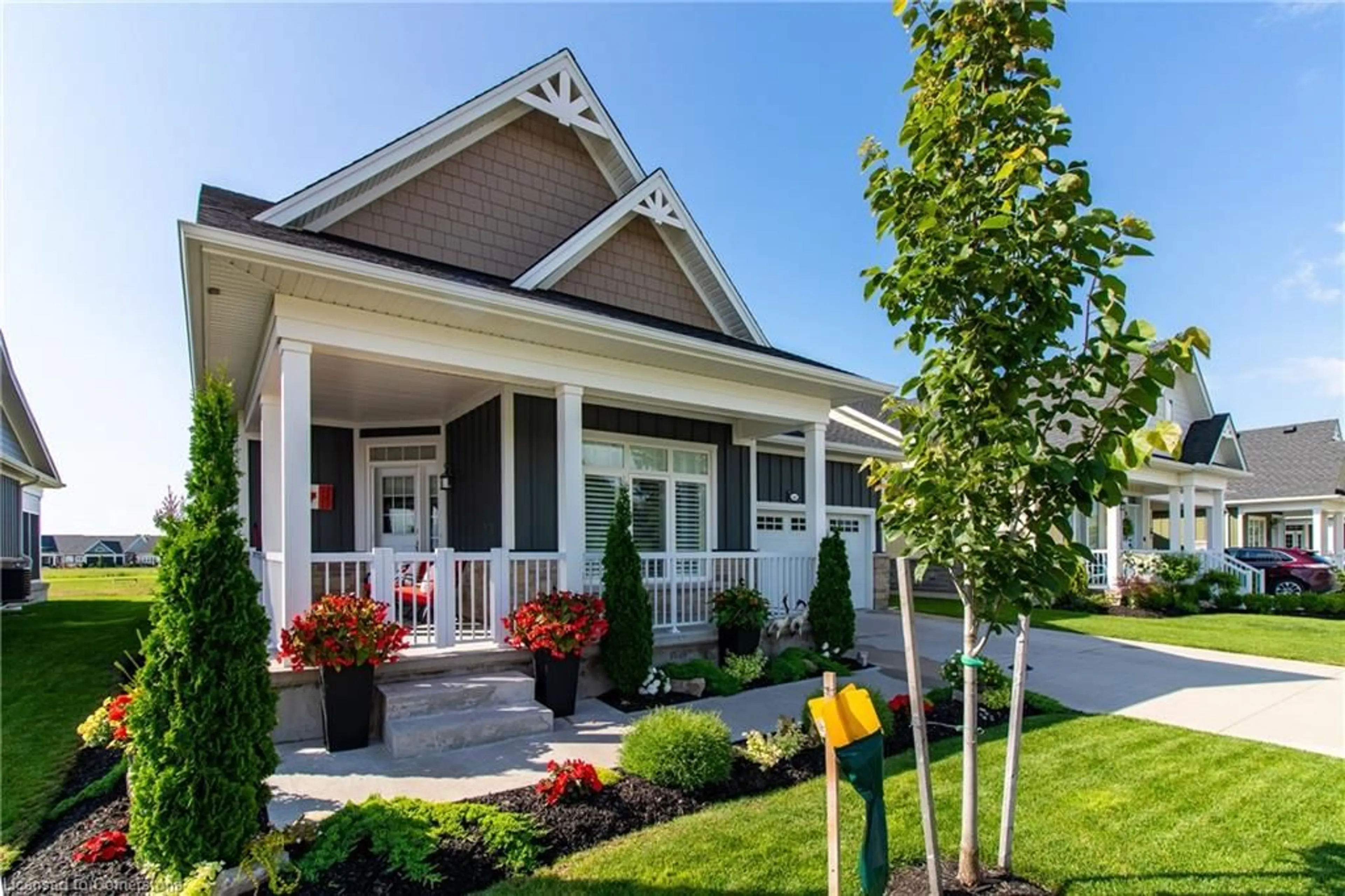 Home with vinyl exterior material, street for 140 Schooner Dr, Port Dover Ontario N0A 1N3