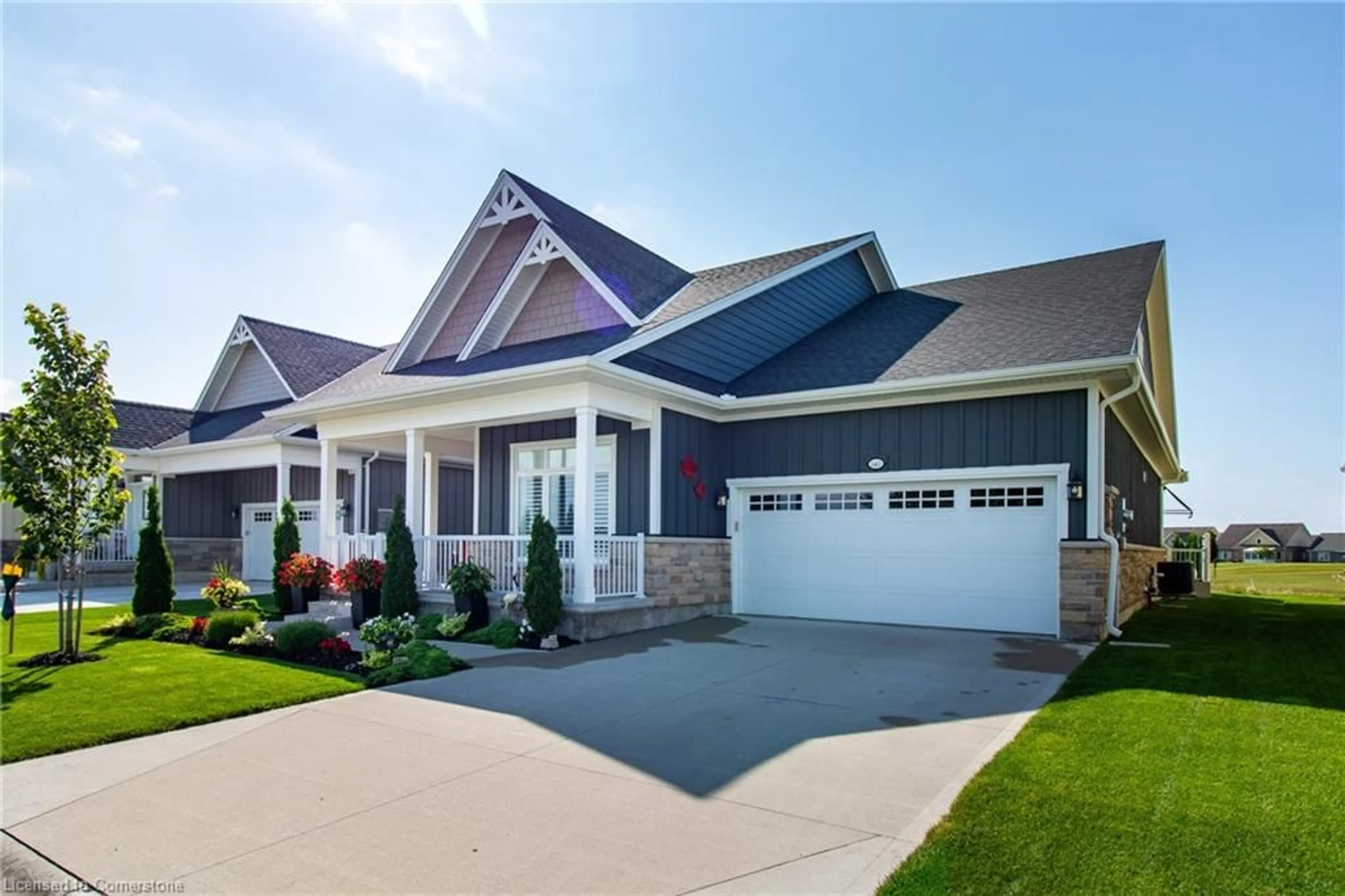 Home with vinyl exterior material, street for 140 Schooner Dr, Port Dover Ontario N0A 1N3