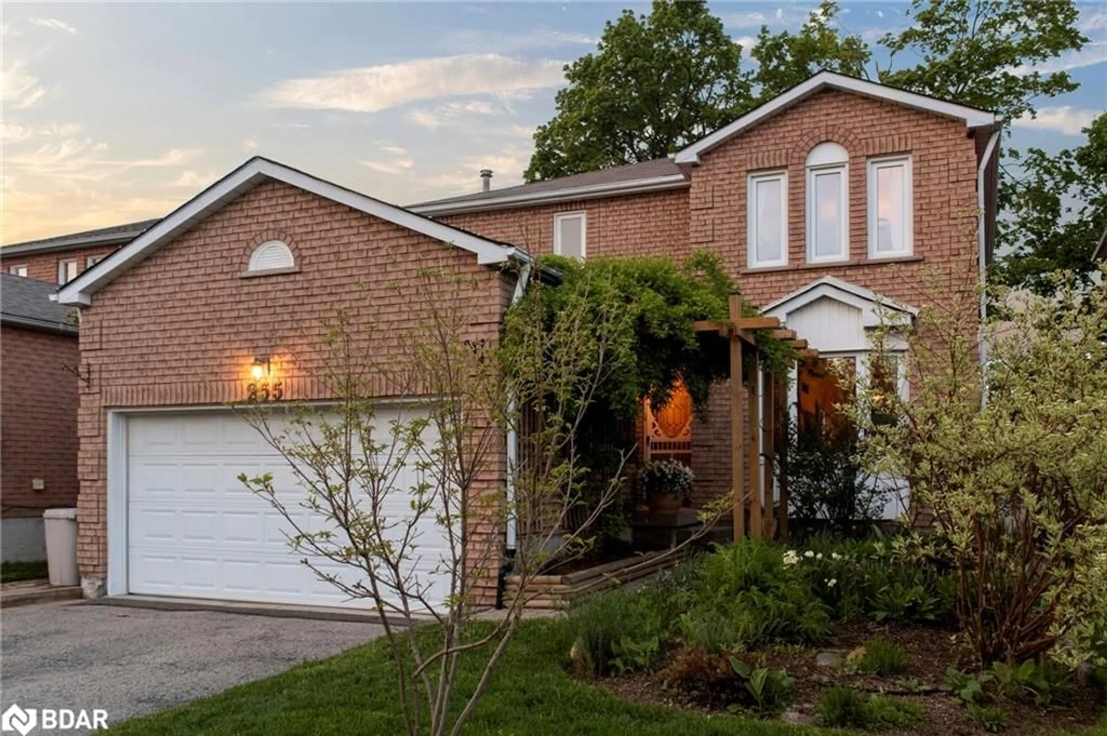 Home with brick exterior material, street for 255 Hickling Trail, Barrie Ontario L4M 5W9