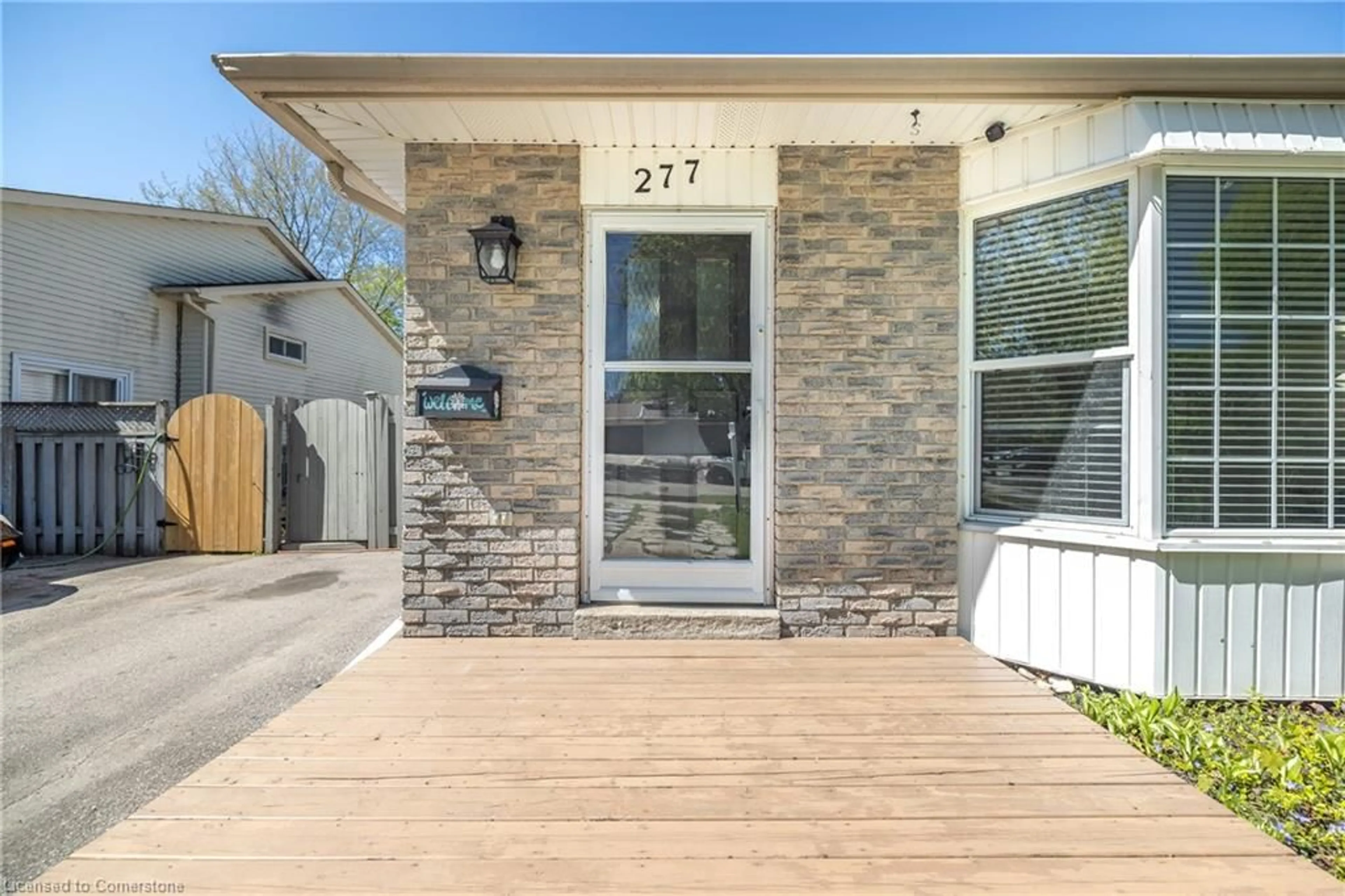Home with brick exterior material, street for 277 Heritage Dr, Kitchener Ontario N2B 3A9
