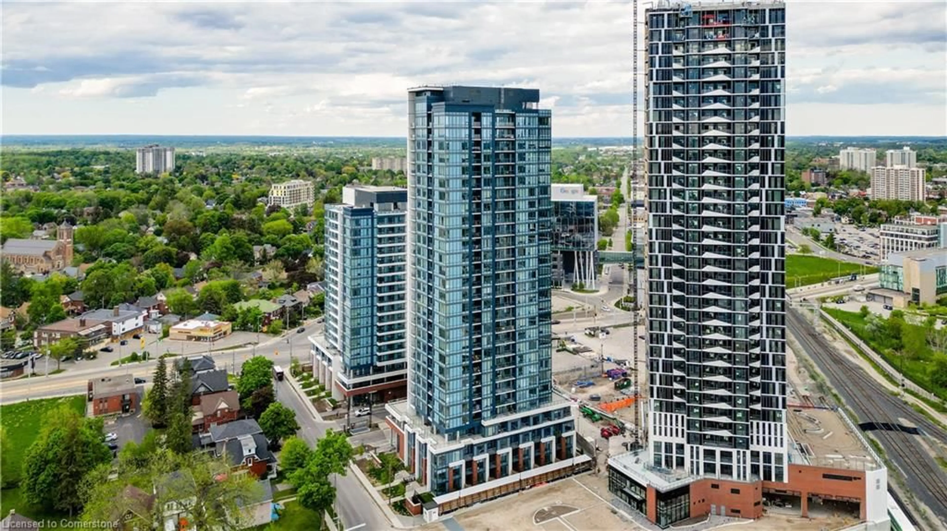 A pic from outside/outdoor area/front of a property/back of a property/a pic from drone, city buildings view from balcony for 15 Wellington St #1001, Kitchener Ontario N2G 0E4