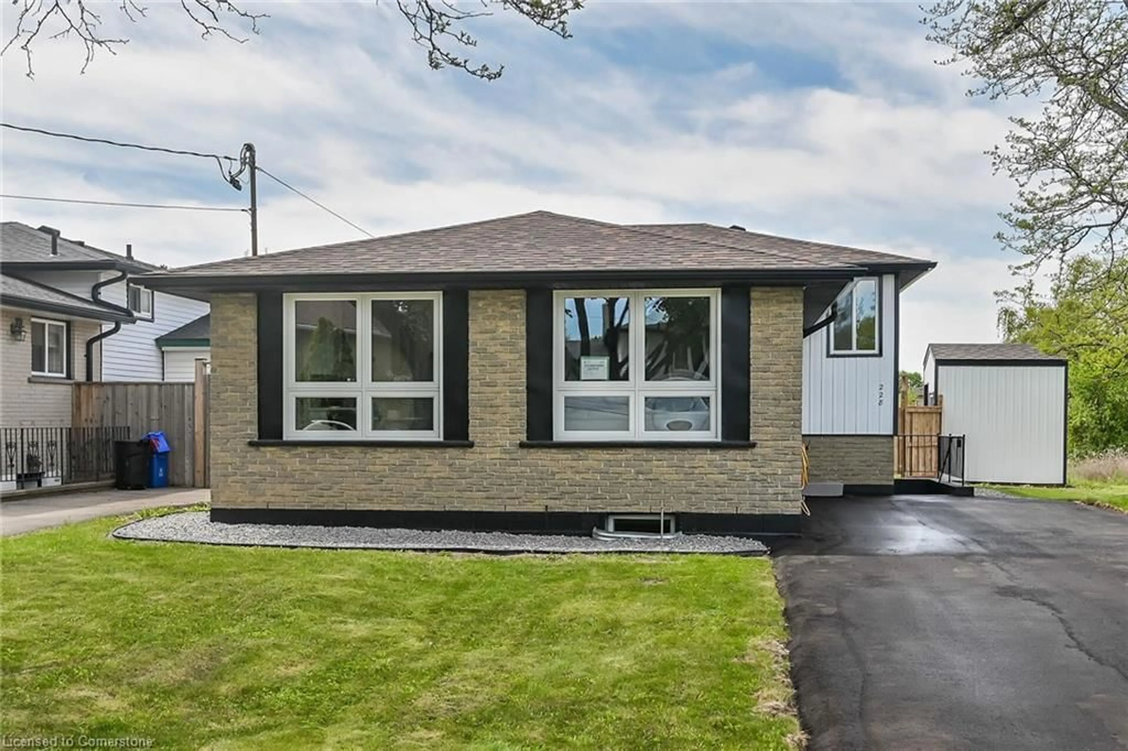 Home with brick exterior material, street for 228 Eaglewood Dr, Hamilton Ontario L8W 1S9