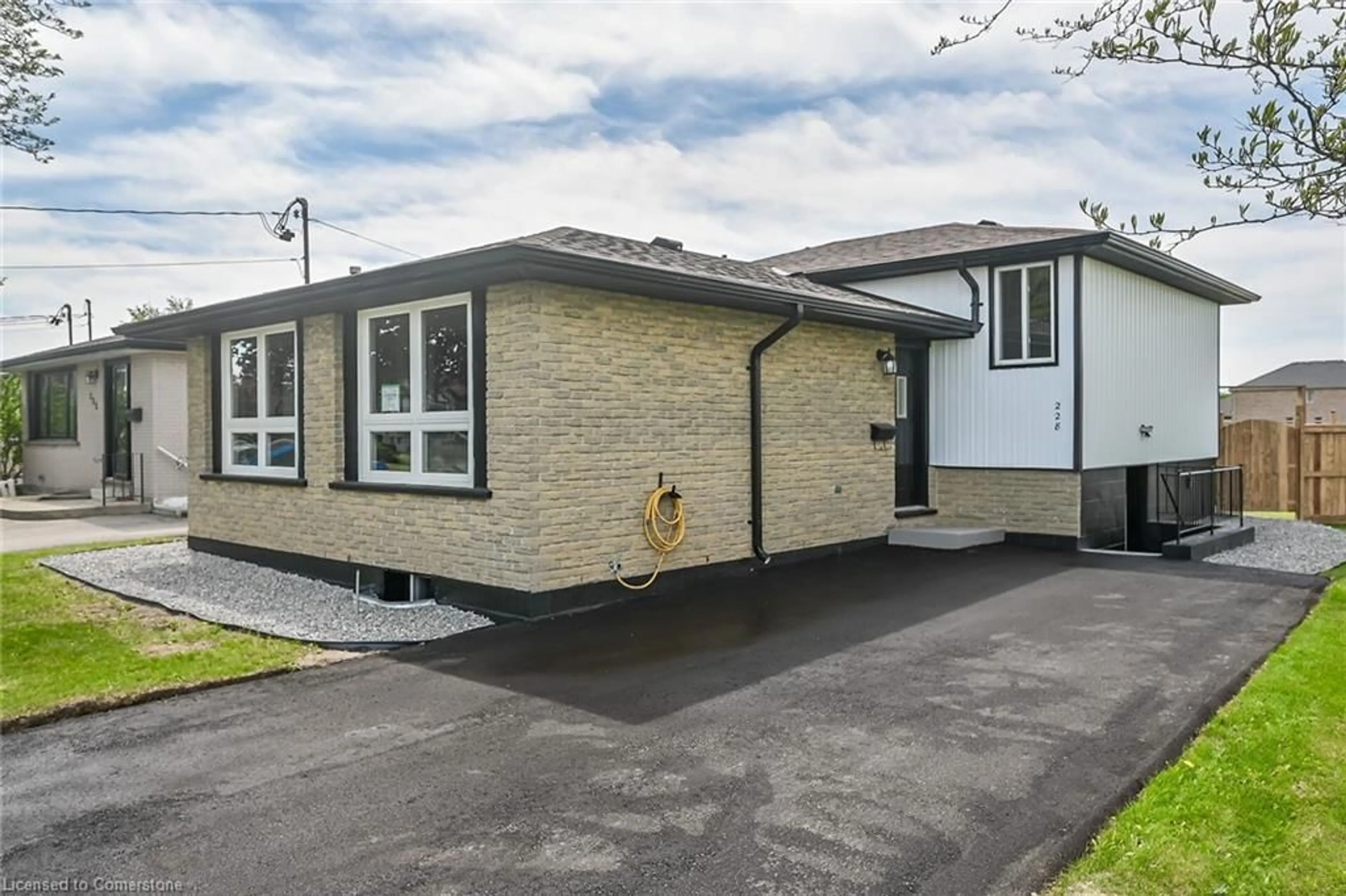 Home with brick exterior material, street for 228 Eaglewood Dr, Hamilton Ontario L8W 1S9