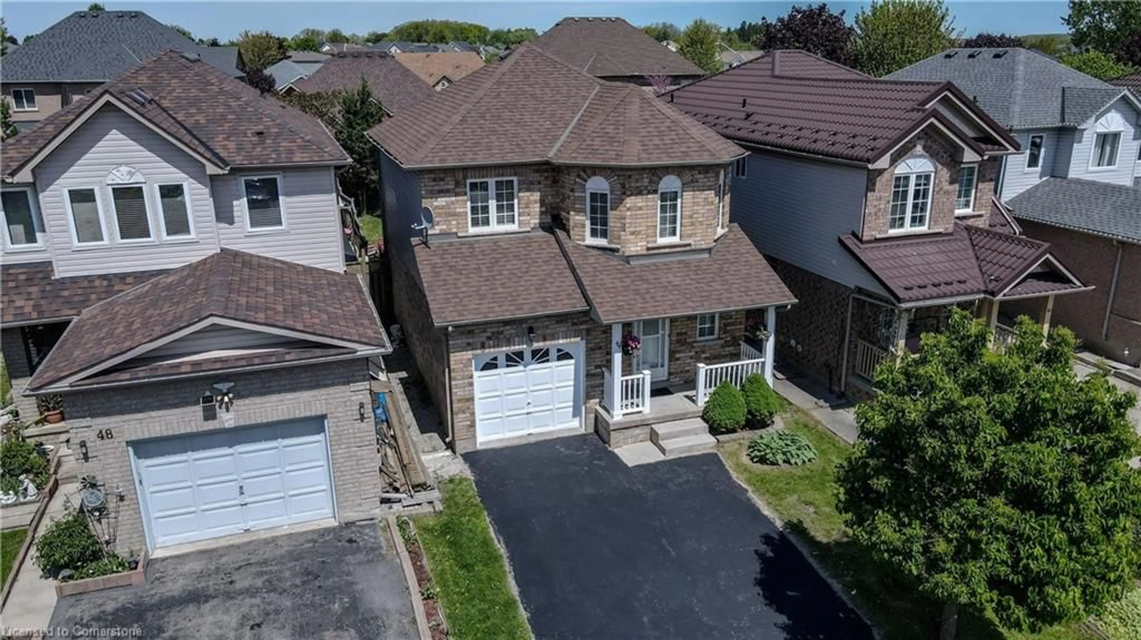 A pic from outside/outdoor area/front of a property/back of a property/a pic from drone, street for 44 Wheeler Dr, Cambridge Ontario N1P 1G4