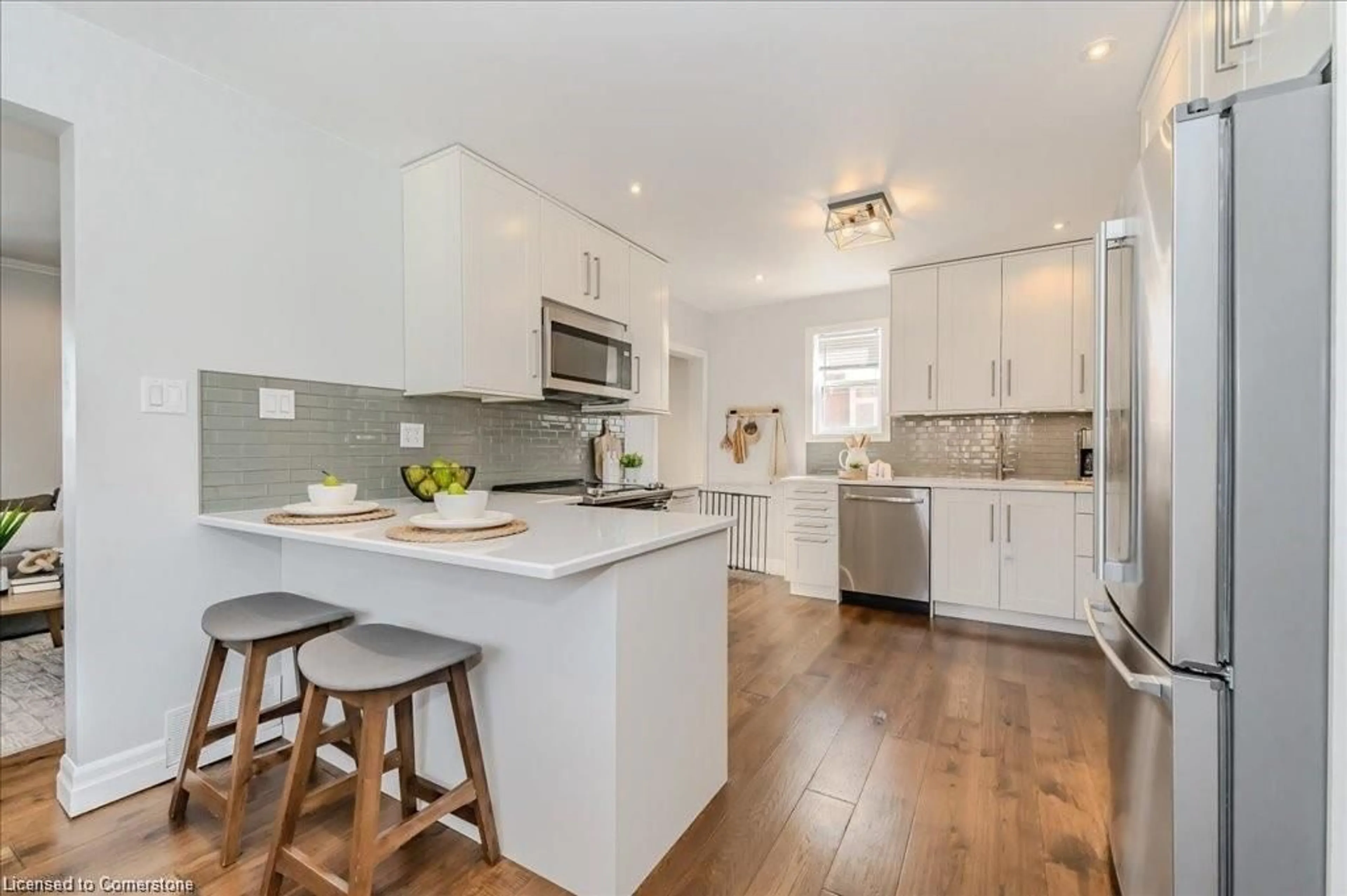 Open concept kitchen, wood/laminate floor for 30 Onward Ave, Kitchener Ontario N2H 3J7