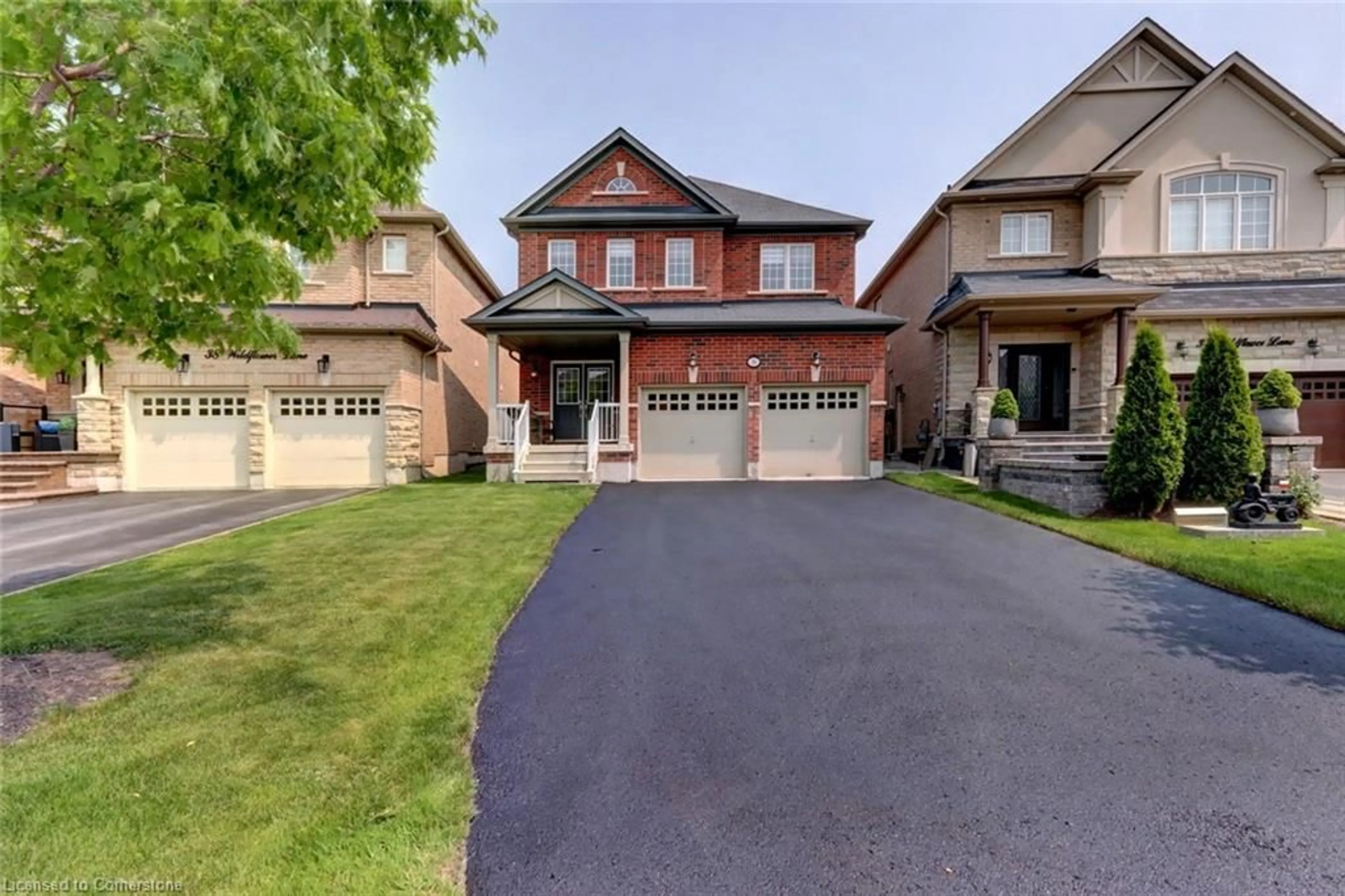 Home with brick exterior material, street for 36 Wildflower Lane, Halton Hills Ontario L7G 0H8