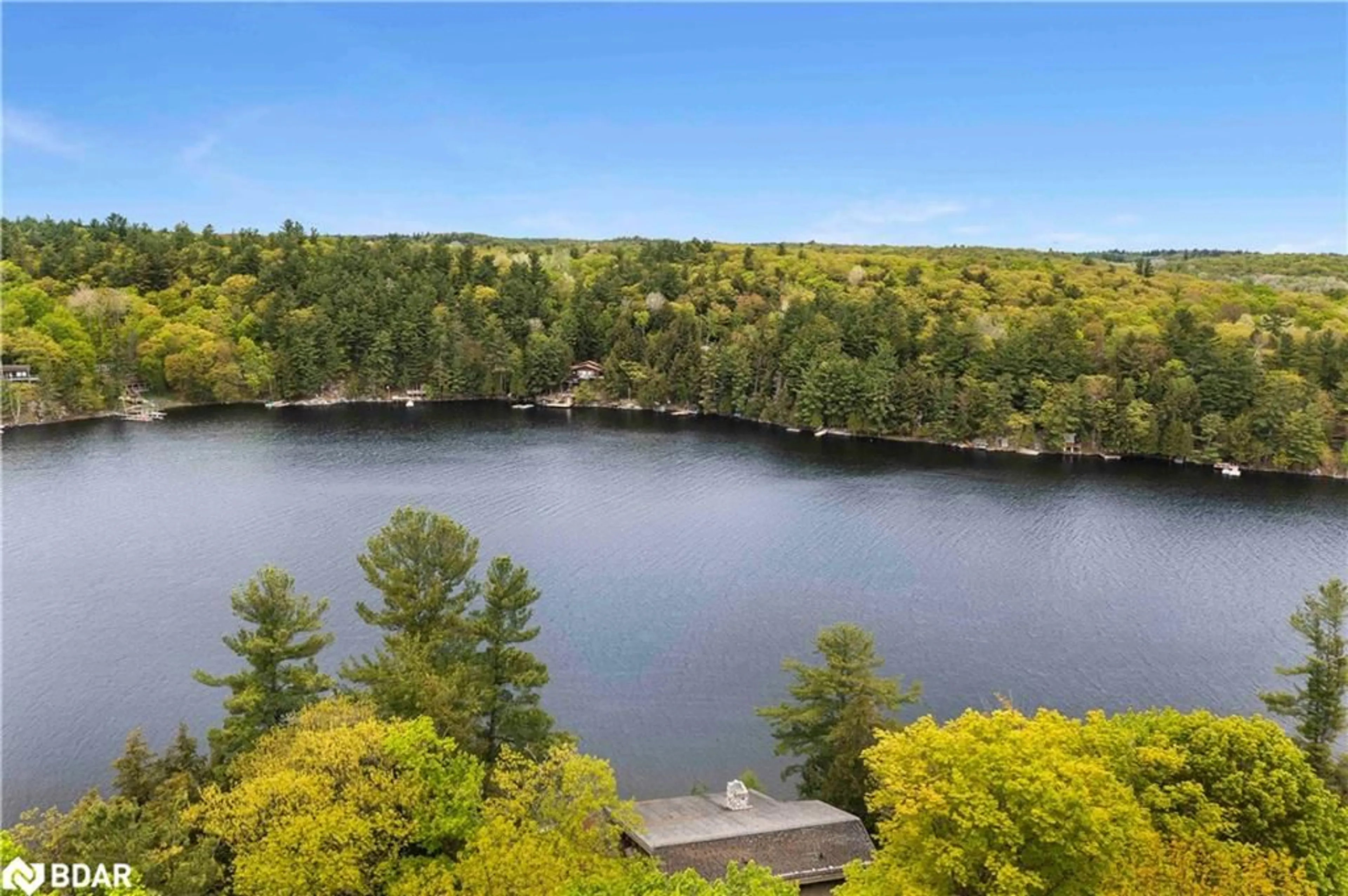 A pic from outside/outdoor area/front of a property/back of a property/a pic from drone, water/lake/river/ocean view for 4 Limbert Lane, Parry Sound Ontario P2A 2W9