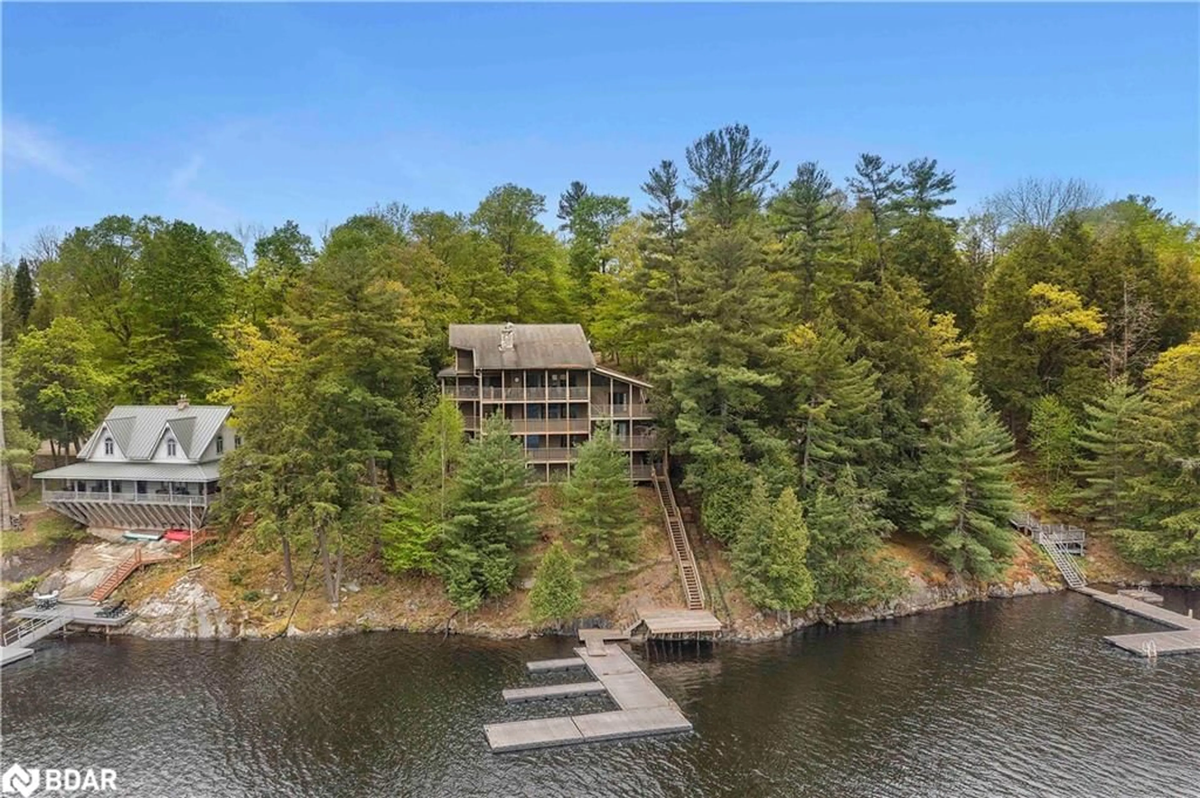 A pic from outside/outdoor area/front of a property/back of a property/a pic from drone, water/lake/river/ocean view for 4 Limbert Lane, Parry Sound Ontario P2A 2W9