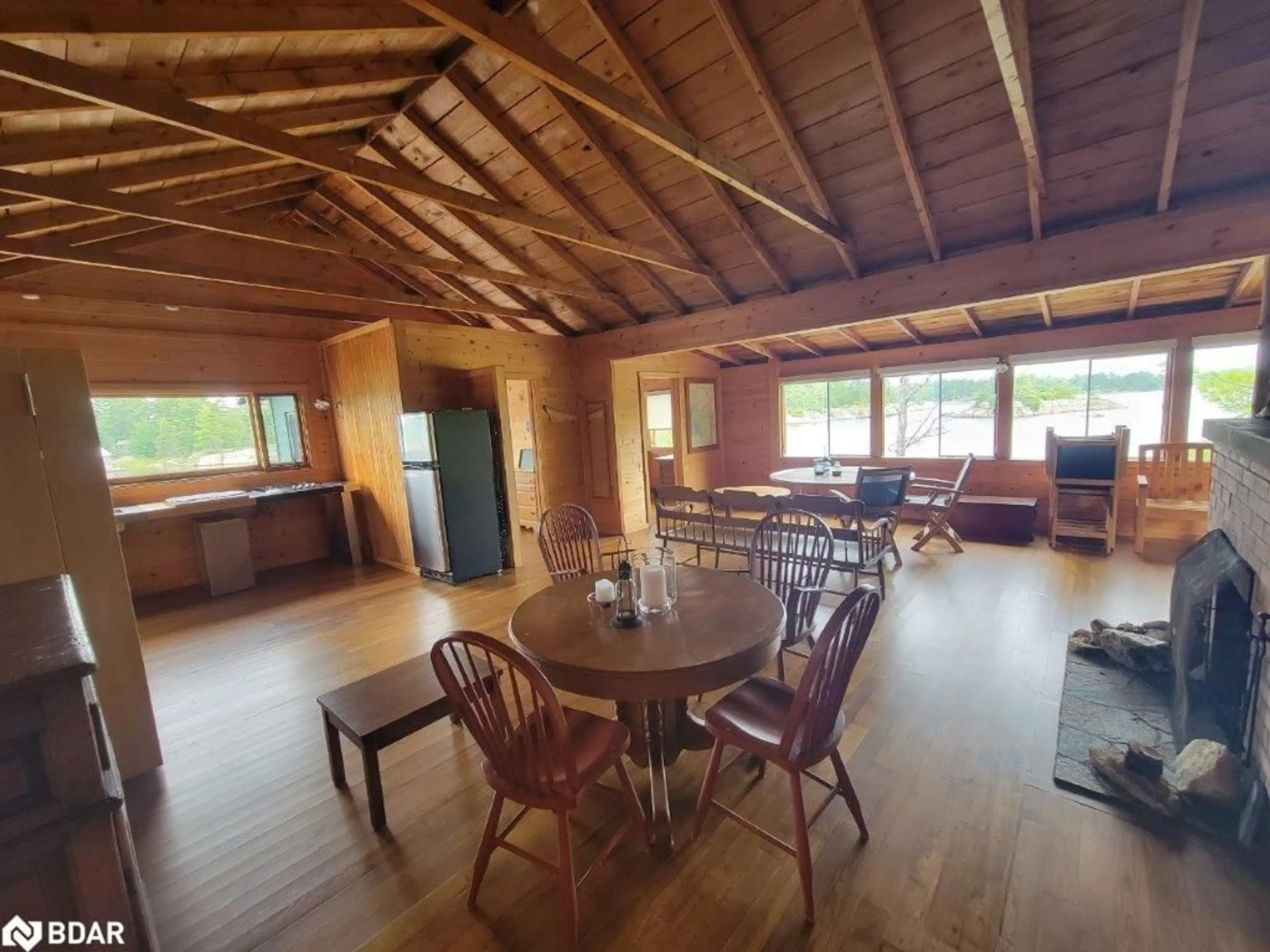 Dining room, wood/laminate floor for 1 A510 Island, Pointe au Baril Ontario P0G 0A3