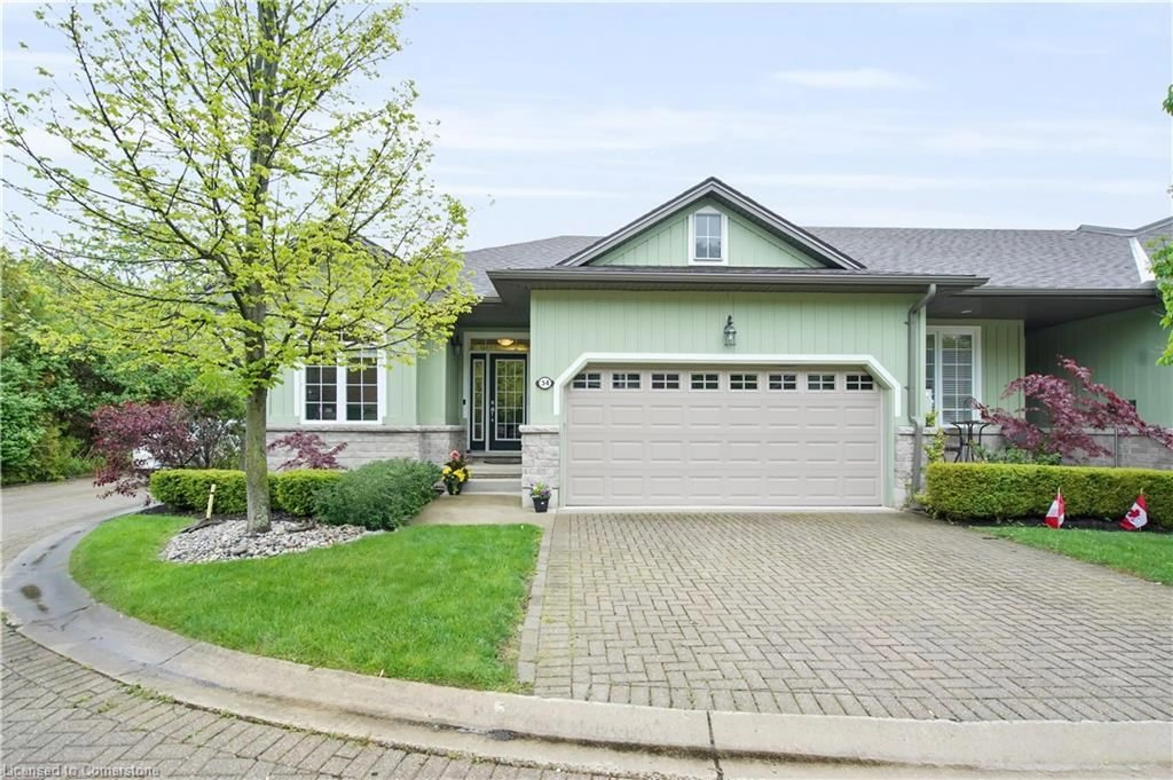 Home with vinyl exterior material, street for 34 Oakwood Links Lane, Grand Bend Ontario N0M 1T0