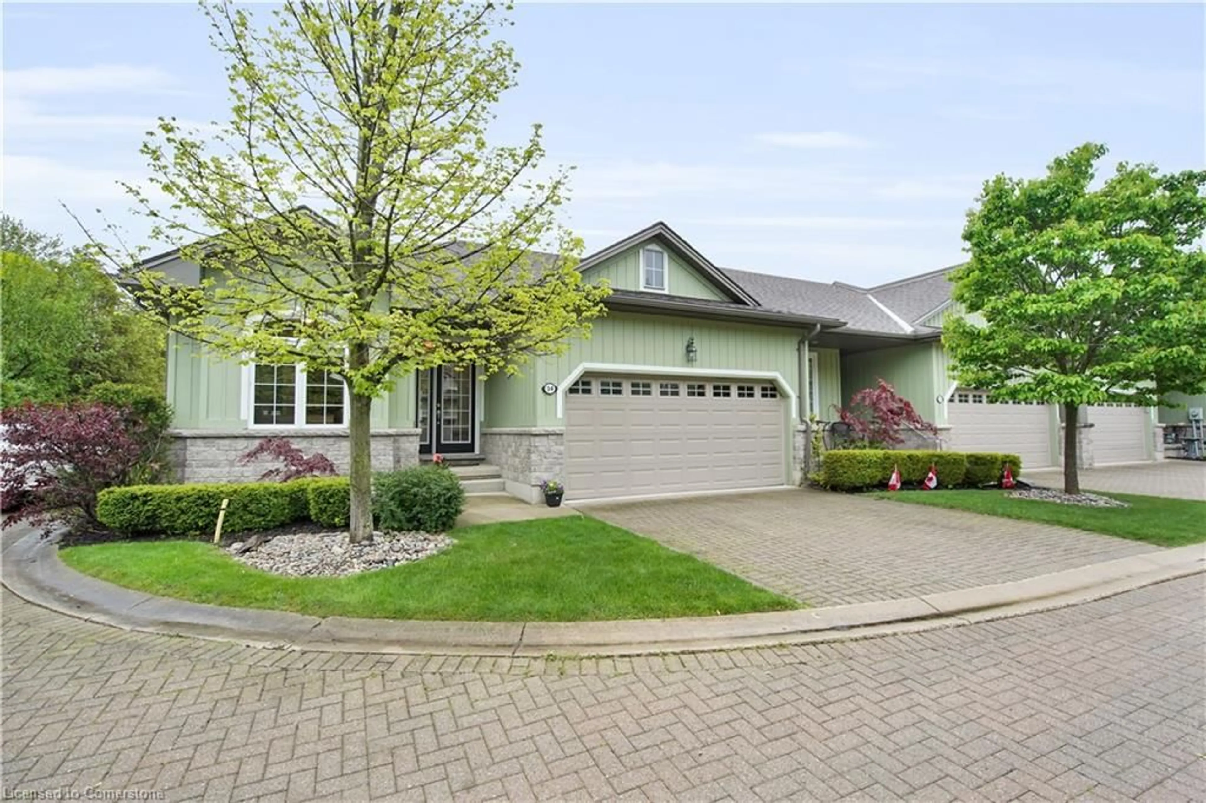 Home with vinyl exterior material, street for 34 Oakwood Links Lane, Grand Bend Ontario N0M 1T0