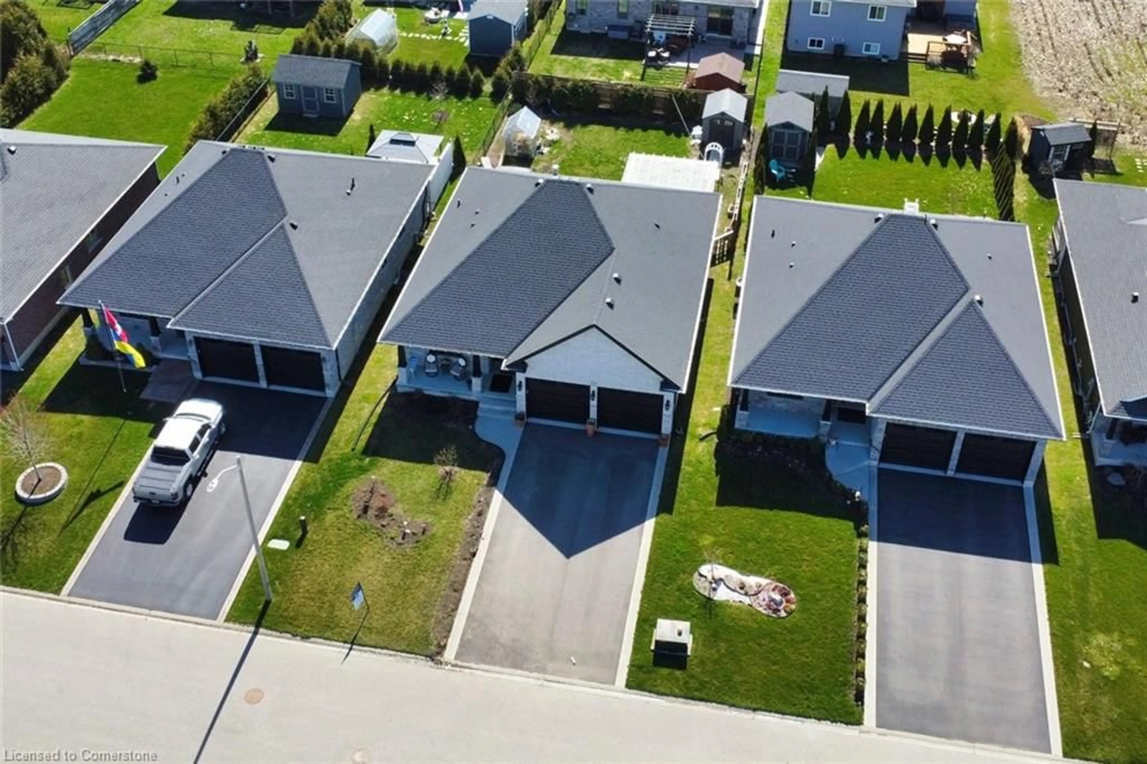 A pic from outside/outdoor area/front of a property/back of a property/a pic from drone, street for 80 Backus Dr, Port Rowan Ontario N0E 1M0