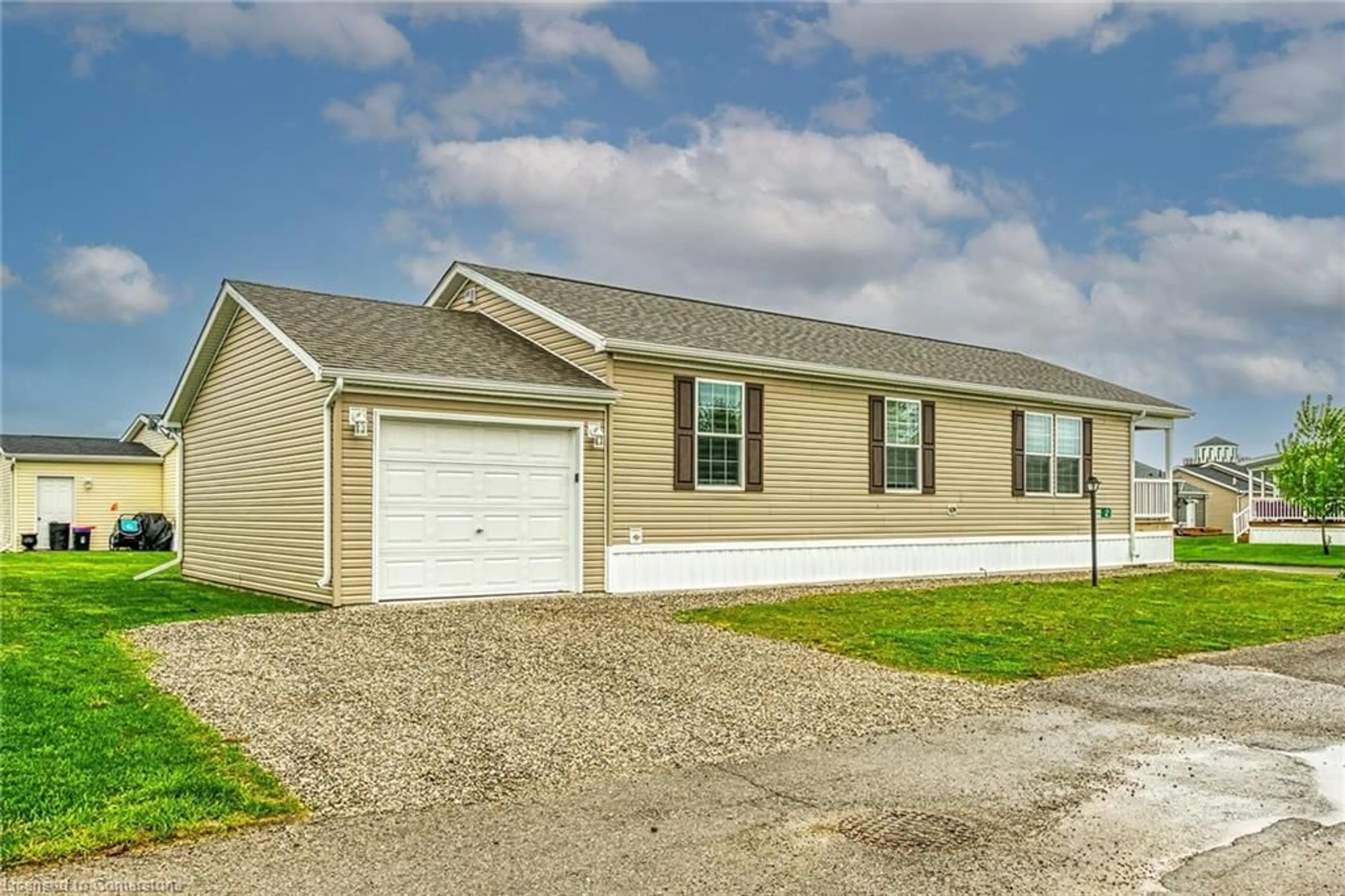 Home with vinyl exterior material, street for 2 Driftwood Cres, Nanticoke Ontario N0A 1L0