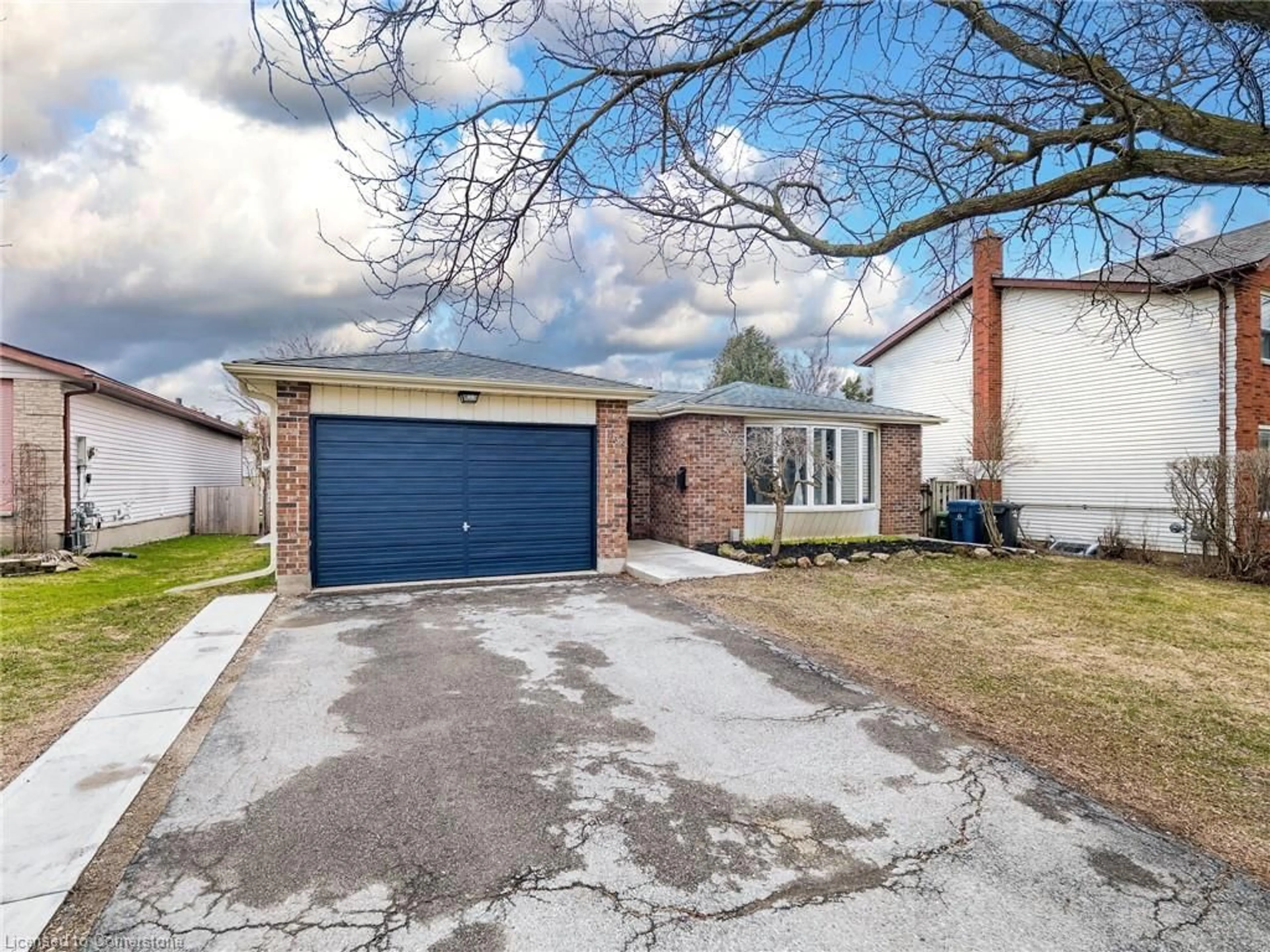 Home with brick exterior material, street for 539 Kortright Rd, Guelph Ontario N1G 3J6