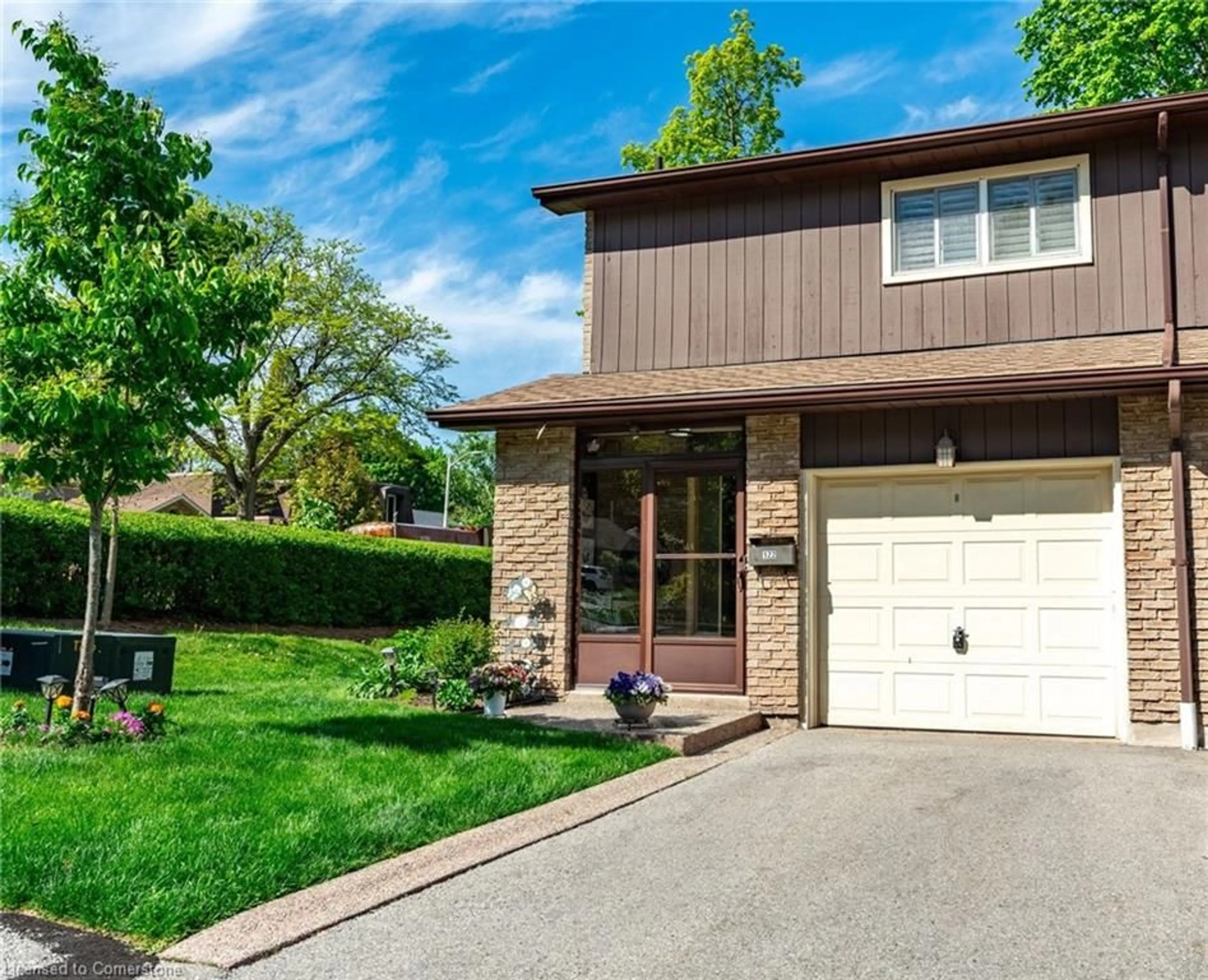 Home with brick exterior material, street for 2301 Cavendish Dr #122, Burlington Ontario L7P 3M3