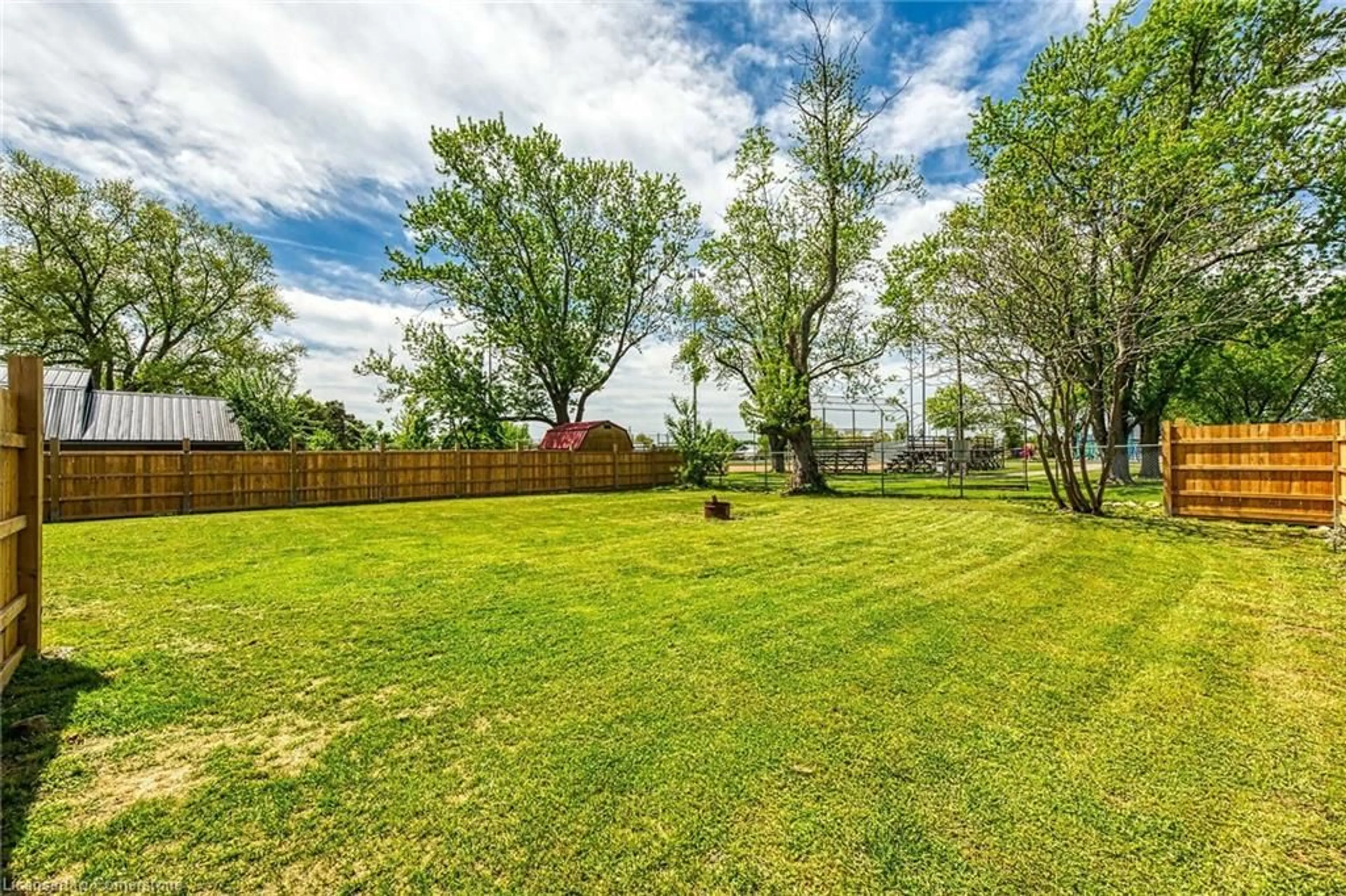 A pic from outside/outdoor area/front of a property/back of a property/a pic from drone, water/lake/river/ocean view for 17 Erie Ave, Fisherville Ontario N0A 1G0