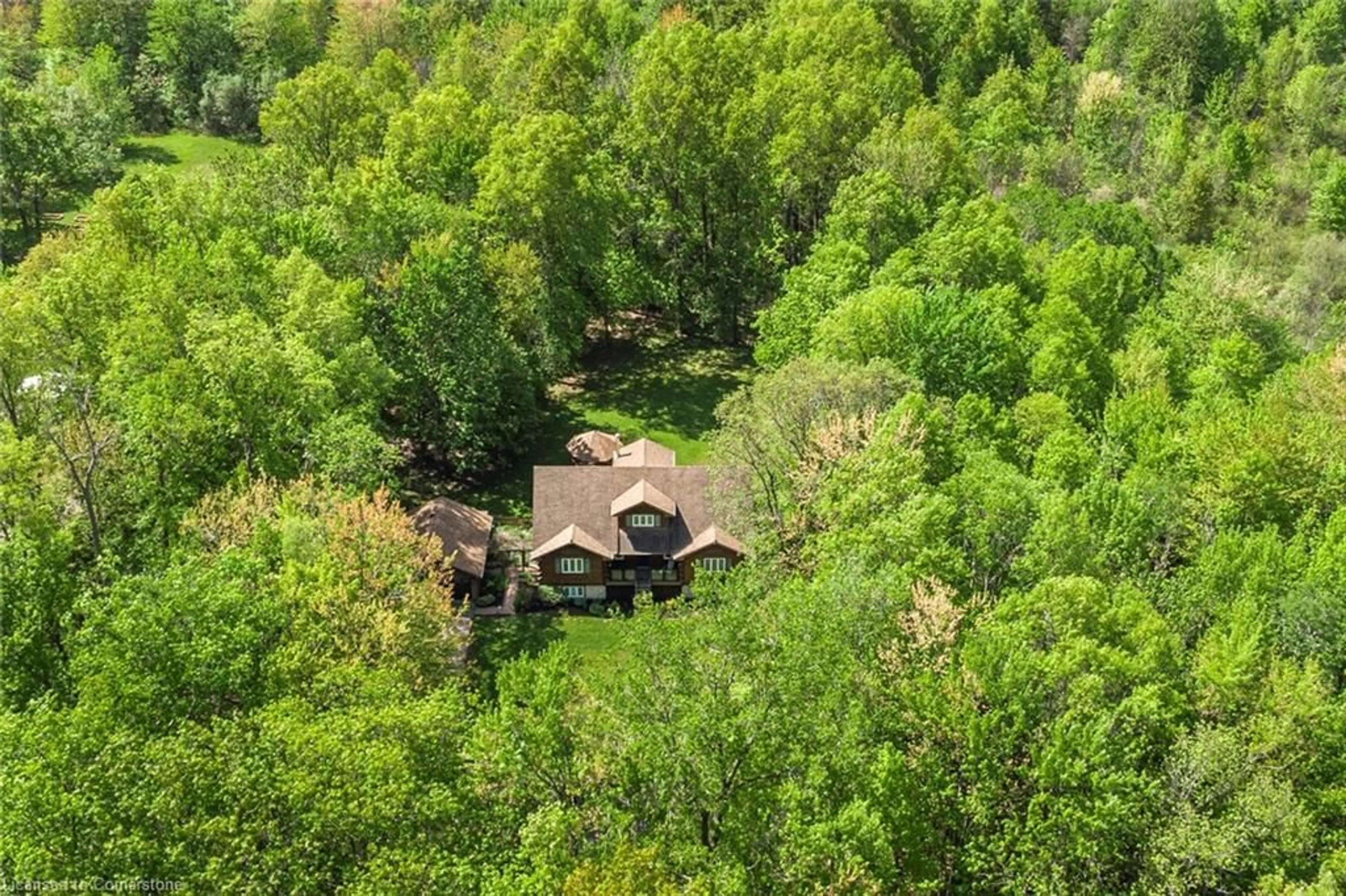 A pic from outside/outdoor area/front of a property/back of a property/a pic from drone, forest/trees view for 51049 Lambert Rd, Welland Ontario L3B 5N6