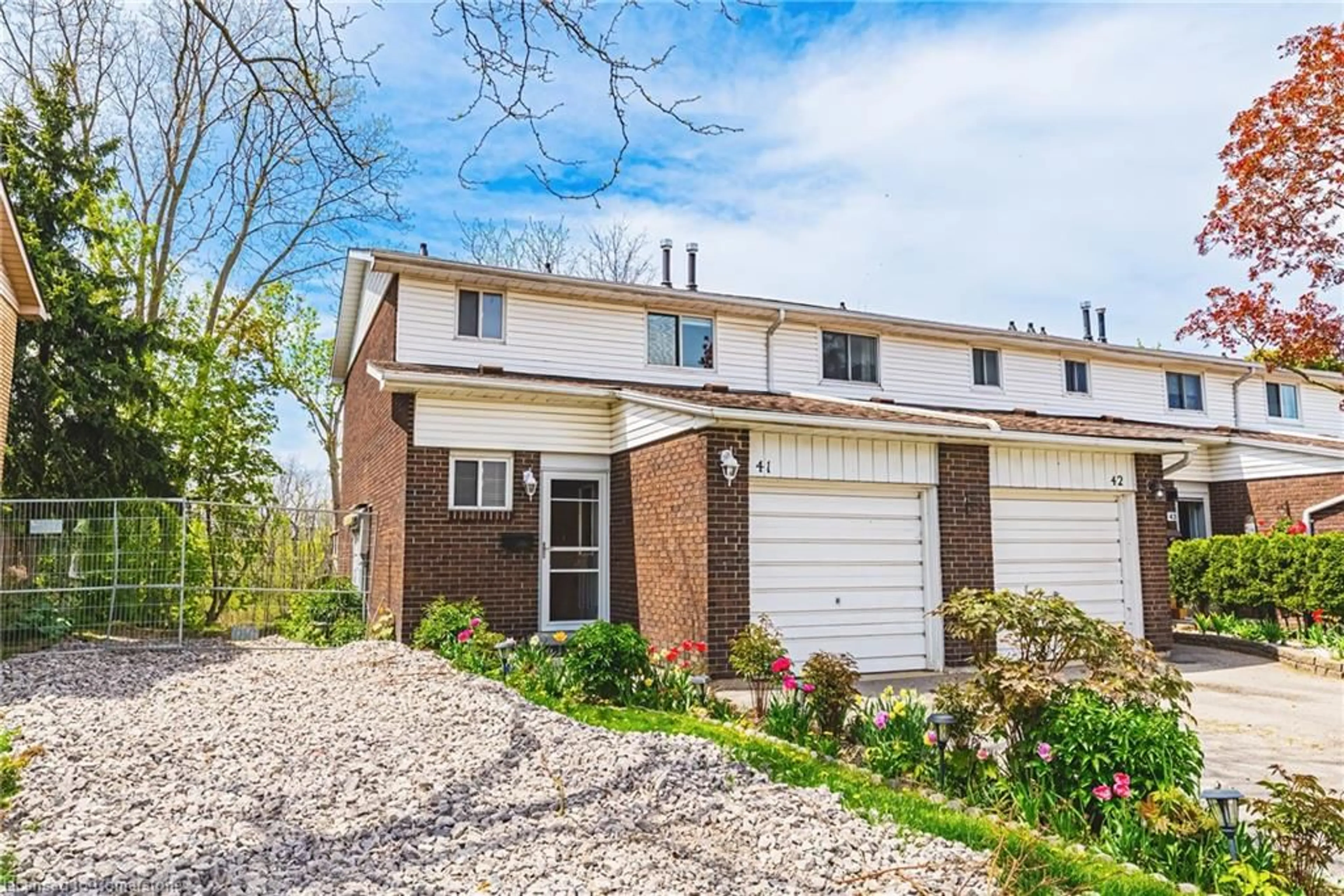 Home with brick exterior material, street for 100 Quigley Rd #41, Hamilton Ontario L8K 6J1