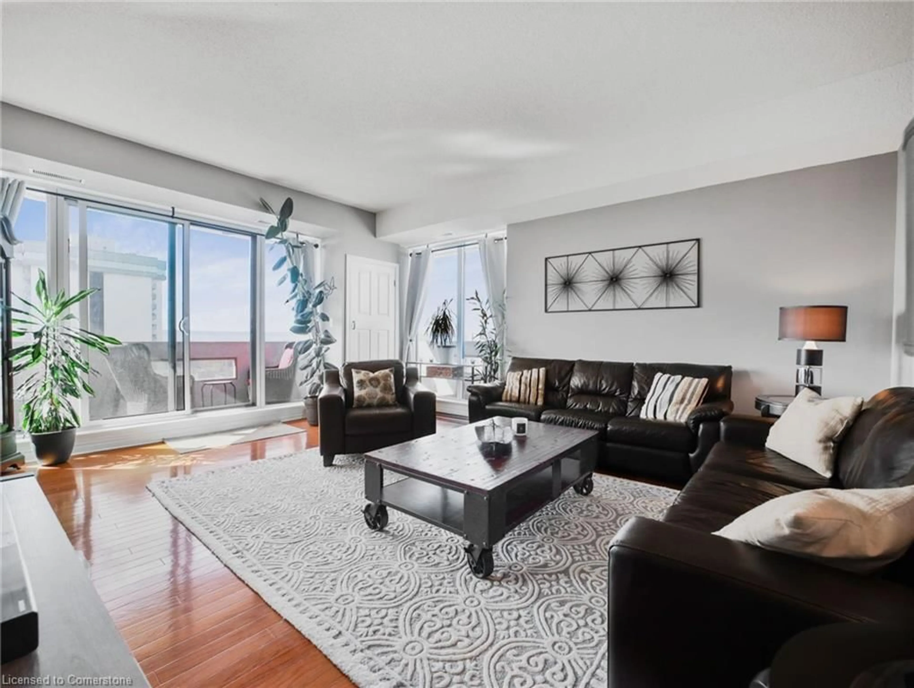 Living room with furniture, unknown for 67 Caroline St #17D, Hamilton Ontario L8P 3K6