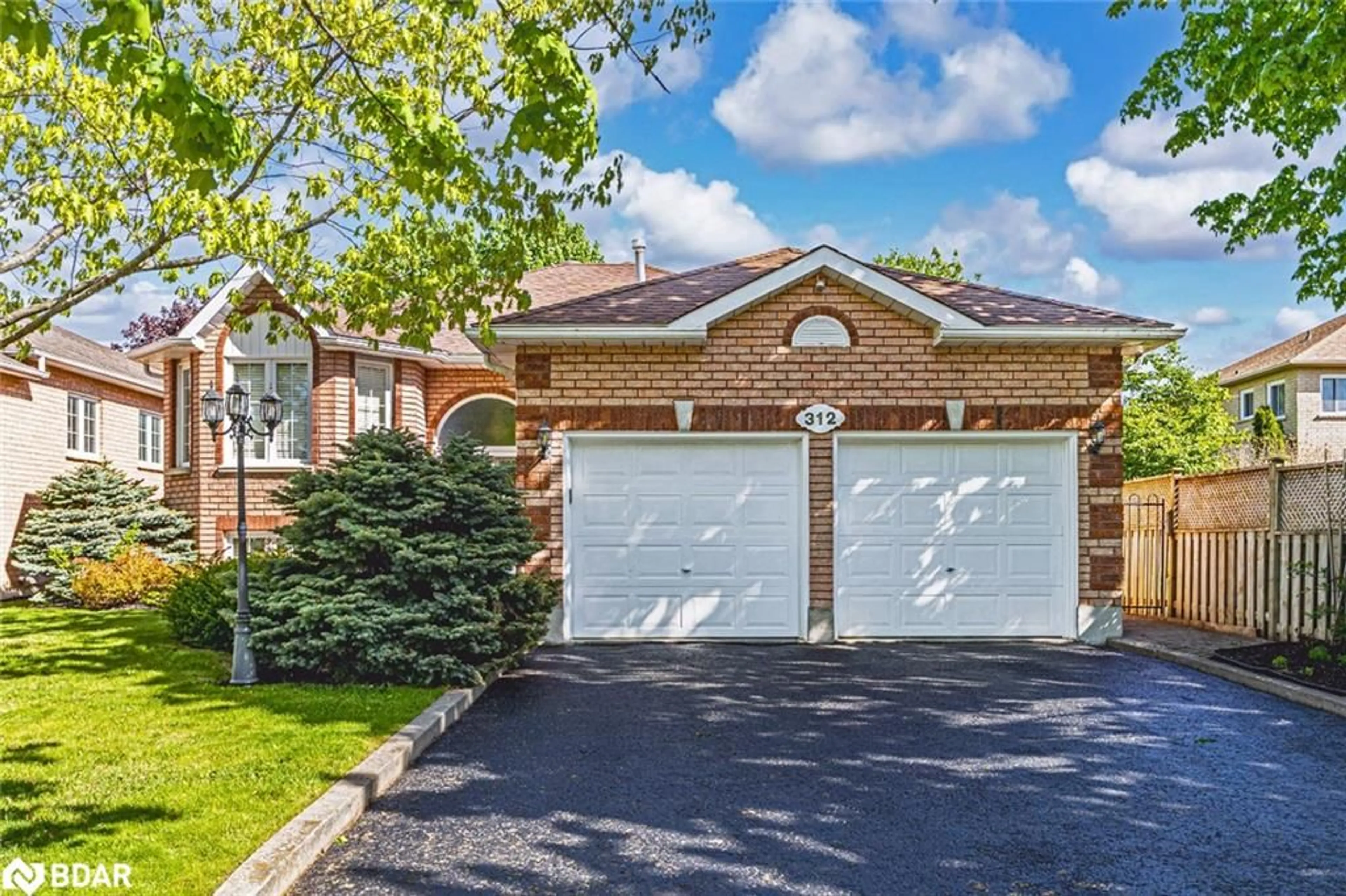 Home with brick exterior material, street for 312 Harvie Rd, Barrie Ontario L4N 8H1
