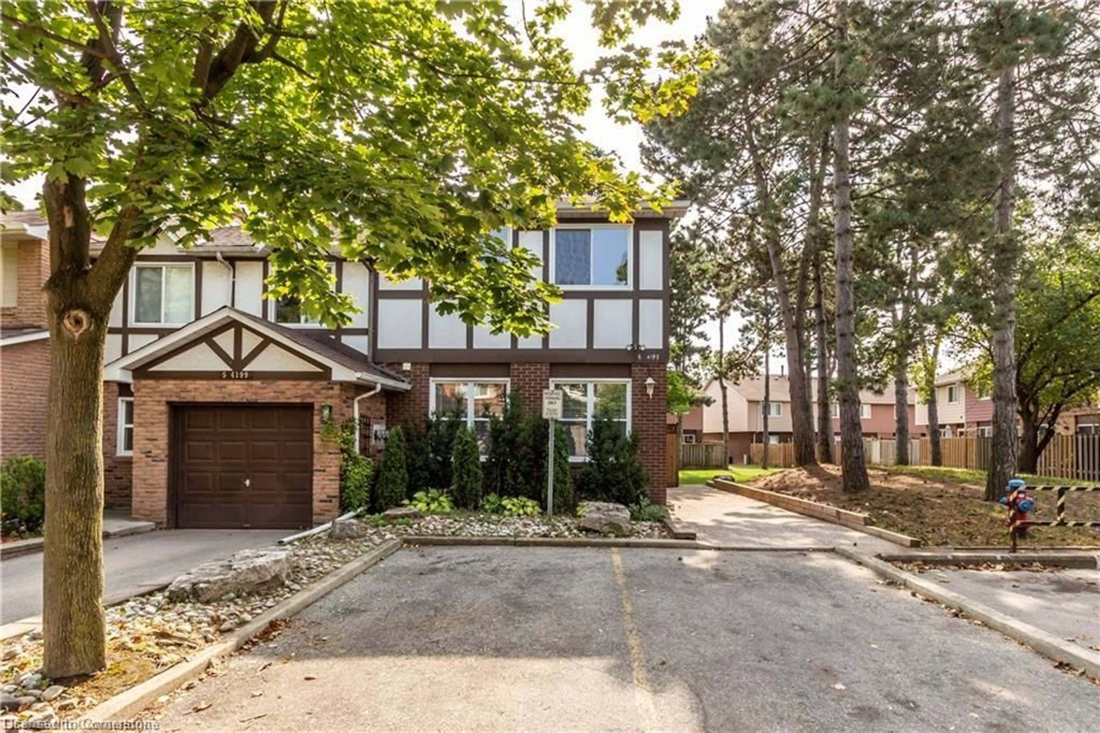 Home with brick exterior material, street for 4199 Longmoor Dr #6, Burlington Ontario L7L 5J9