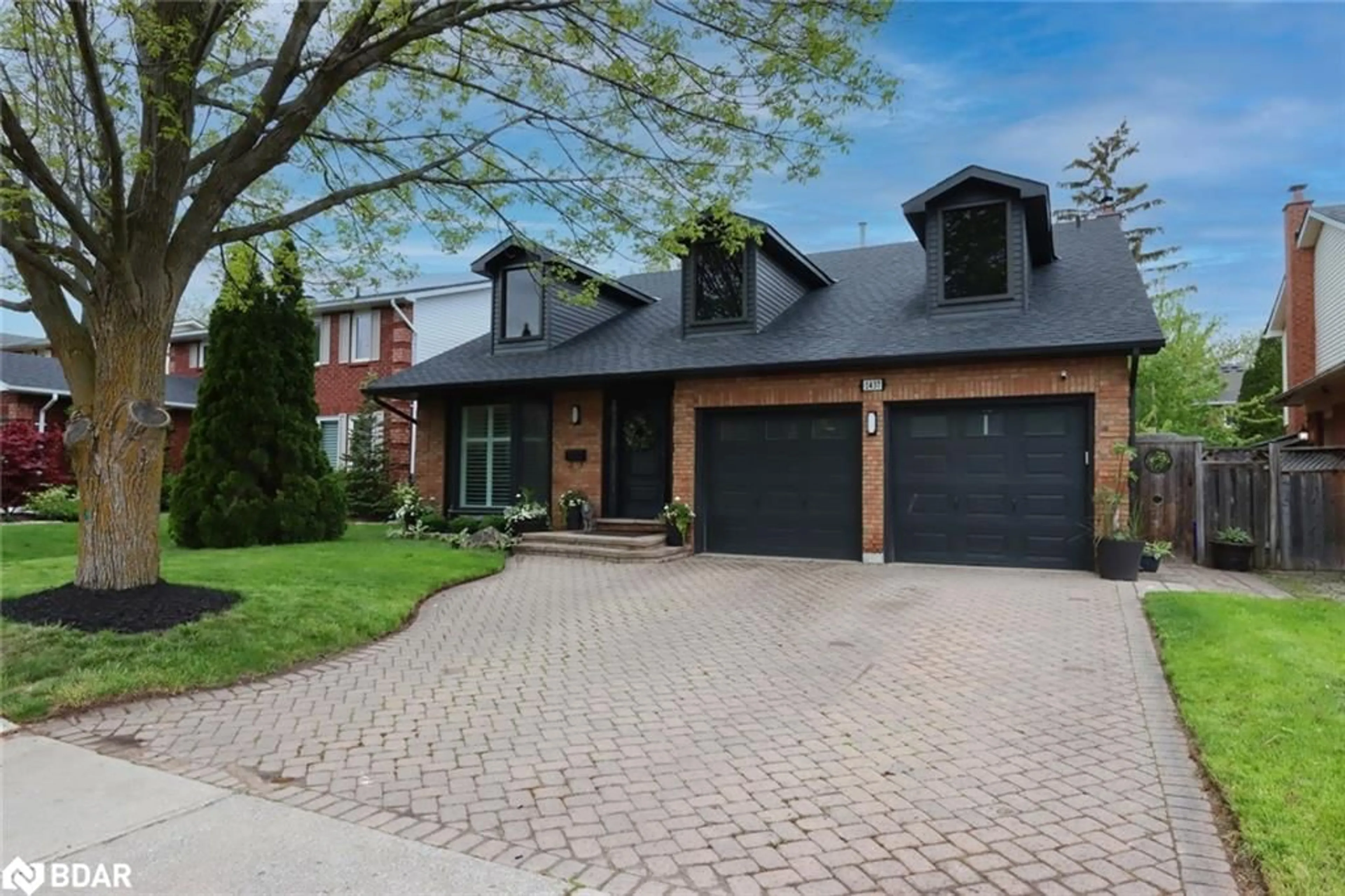 Home with brick exterior material, street for 1437 Thistledown Rd, Oakville Ontario L6M 1Z1