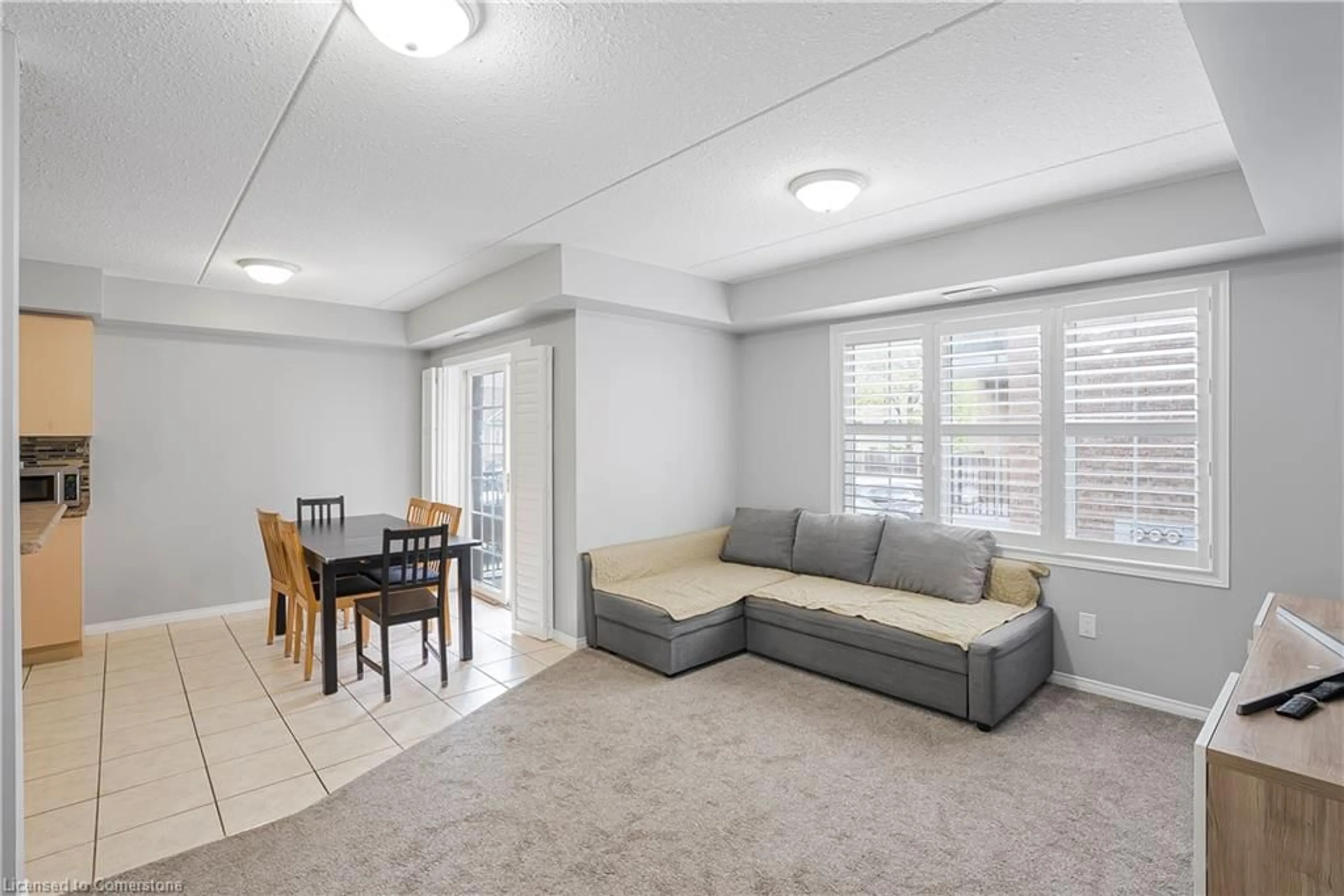 Living room with furniture, unknown for 12 Holborn St #B11, Kitchener Ontario N2A 0A4