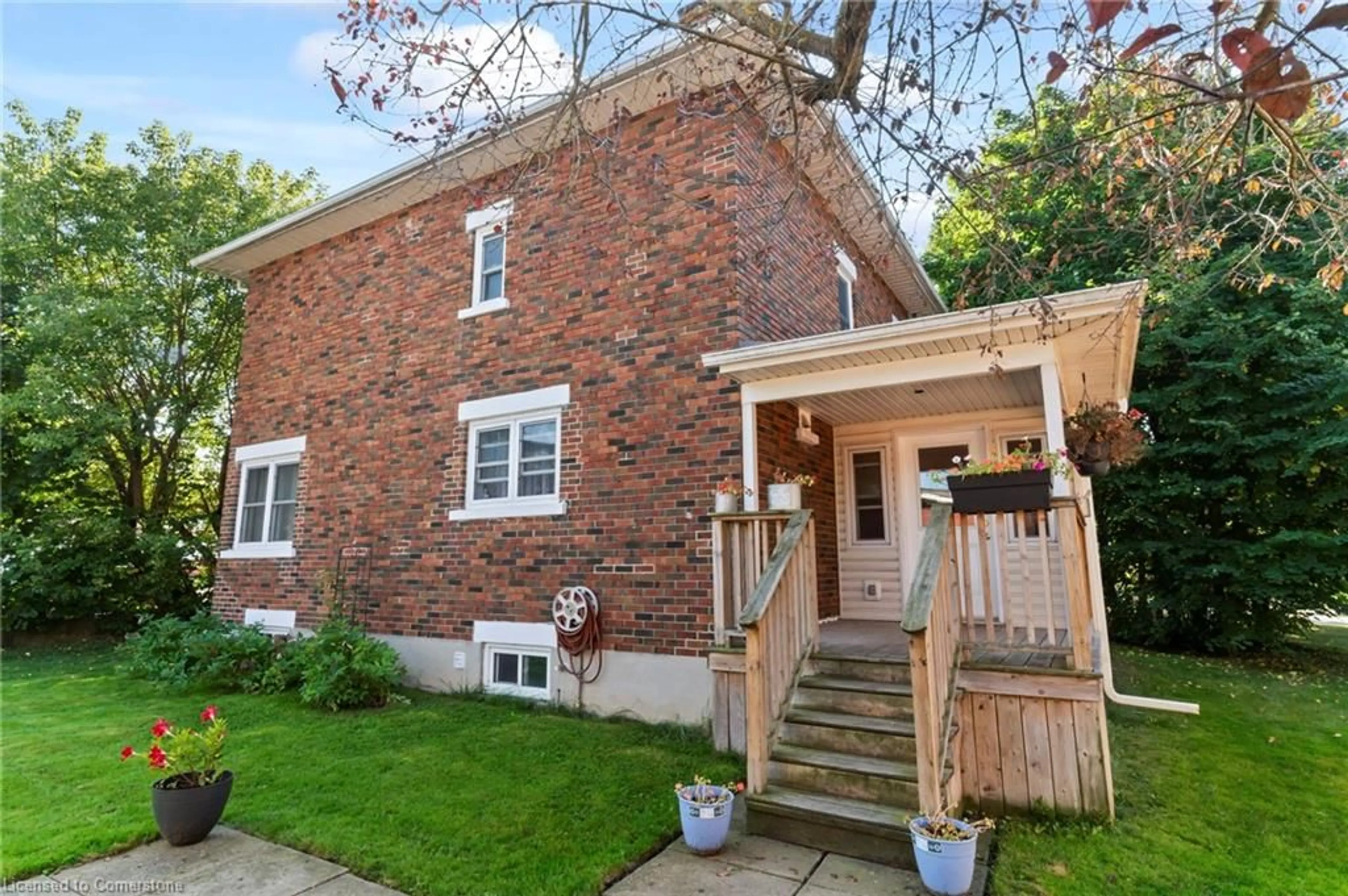 Home with brick exterior material, street for 121 Queen St, Mount Forest Ontario N0G 2L3