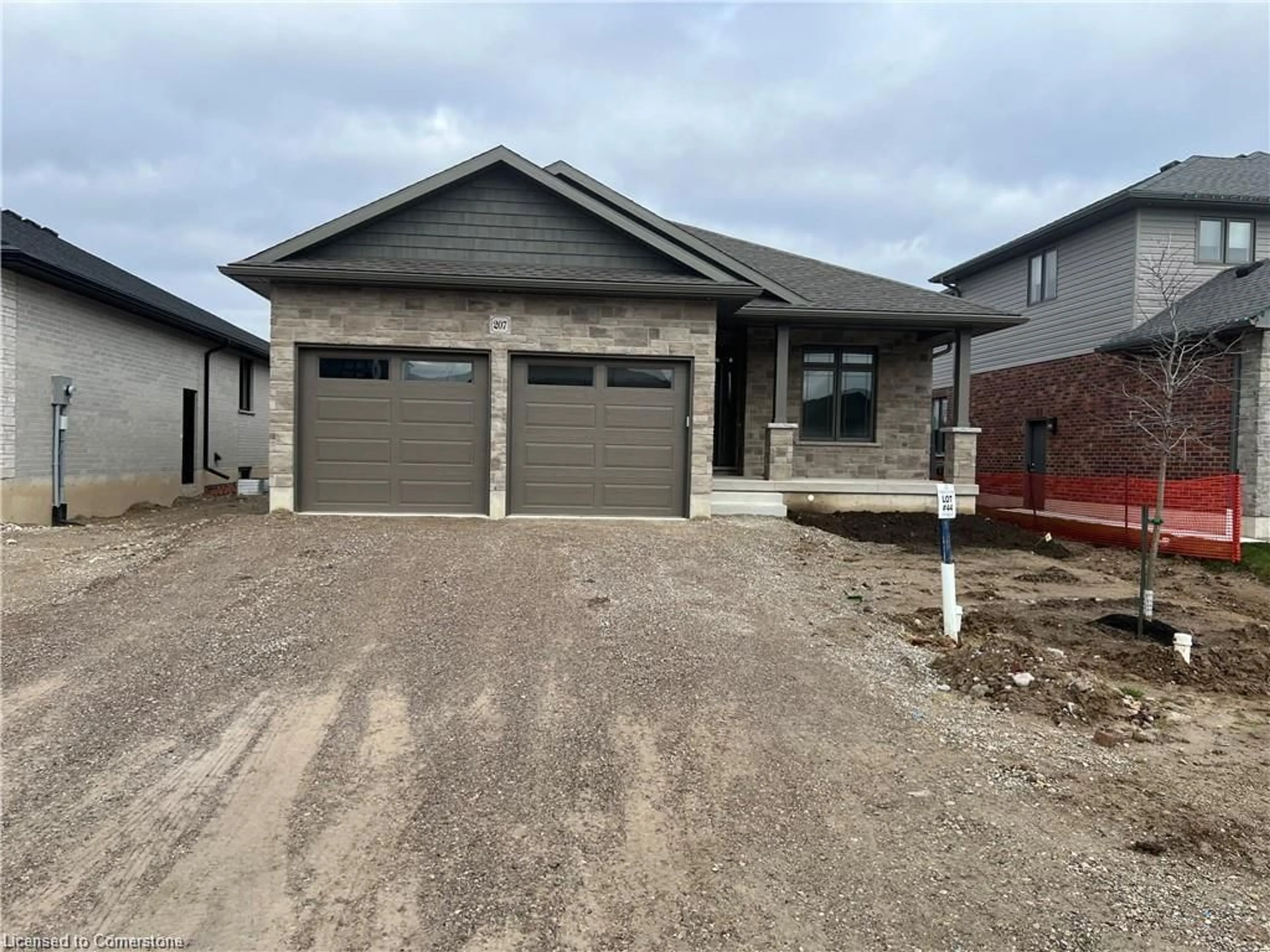 Home with brick exterior material, street for 207 Arden Cres #UPPER LEVEL, Mitchell Ontario N0K 1N0
