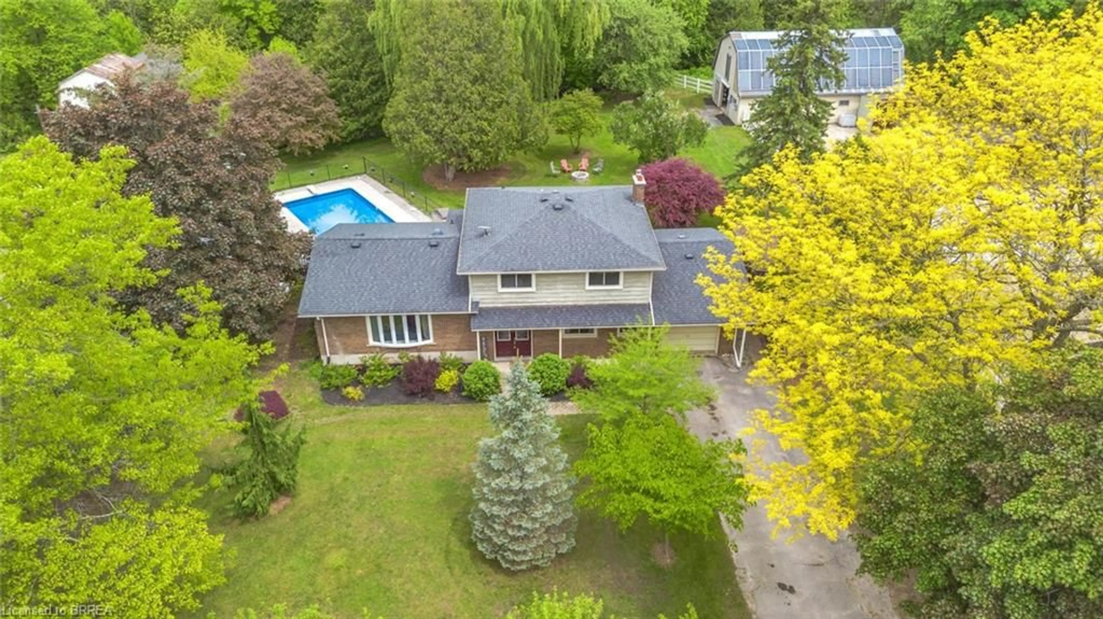 A pic from outside/outdoor area/front of a property/back of a property/a pic from drone, street for 56 Fifth Concession Rd, Burford Ontario N0A 1A0