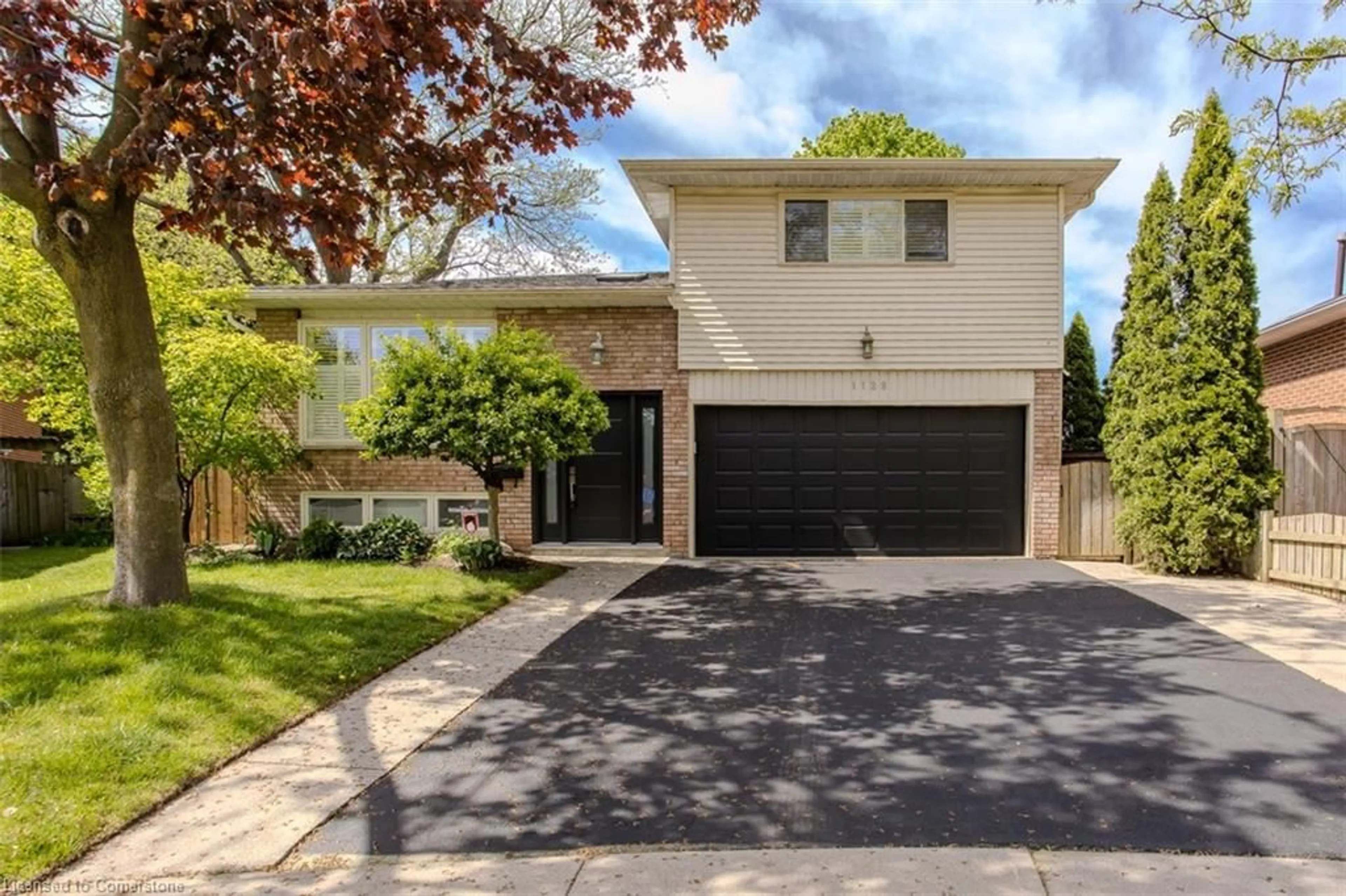 Home with brick exterior material, street for 1128 Dowland Cres, Burlington Ontario L7T 4C9