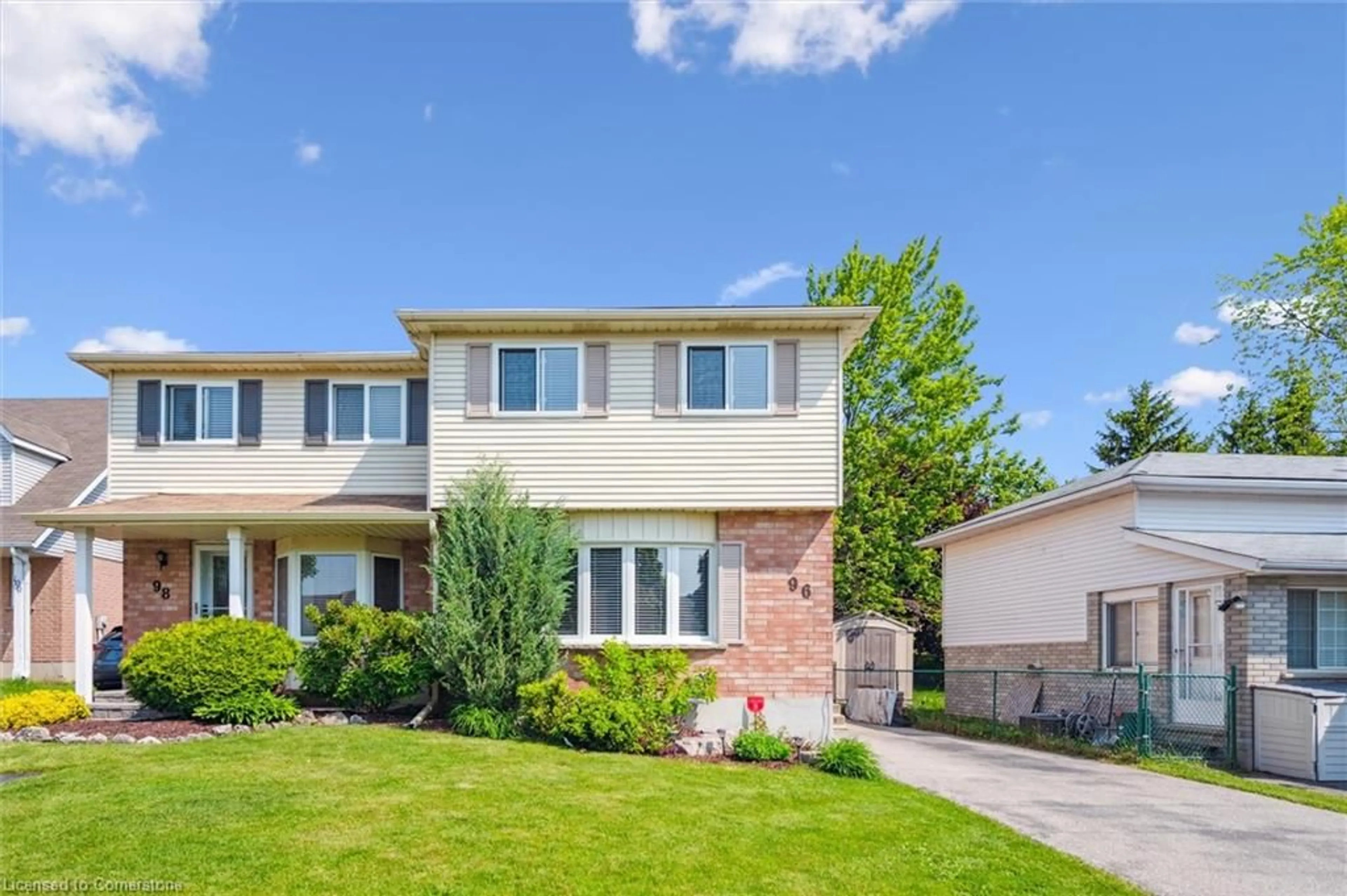 Home with vinyl exterior material, street for 96 Bankside Dr, Kitchener Ontario N2N 3G1