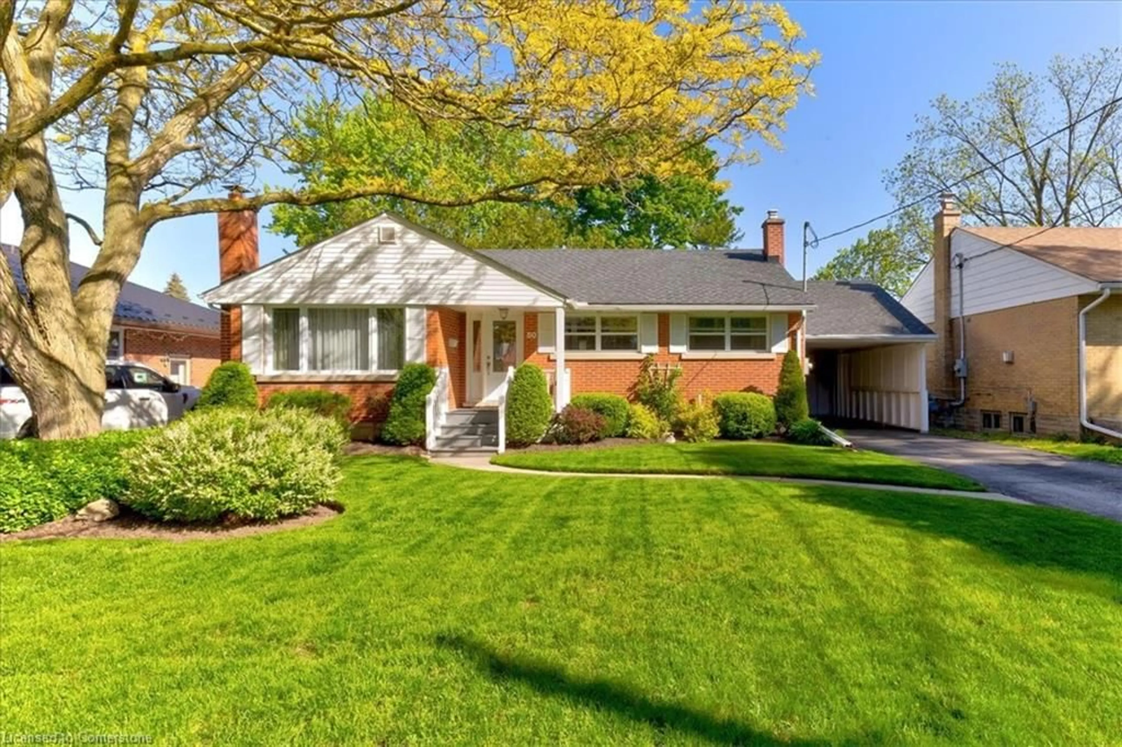 Home with brick exterior material, street for 50 Wandsworth Pl, Kitchener Ontario N2B 1J1