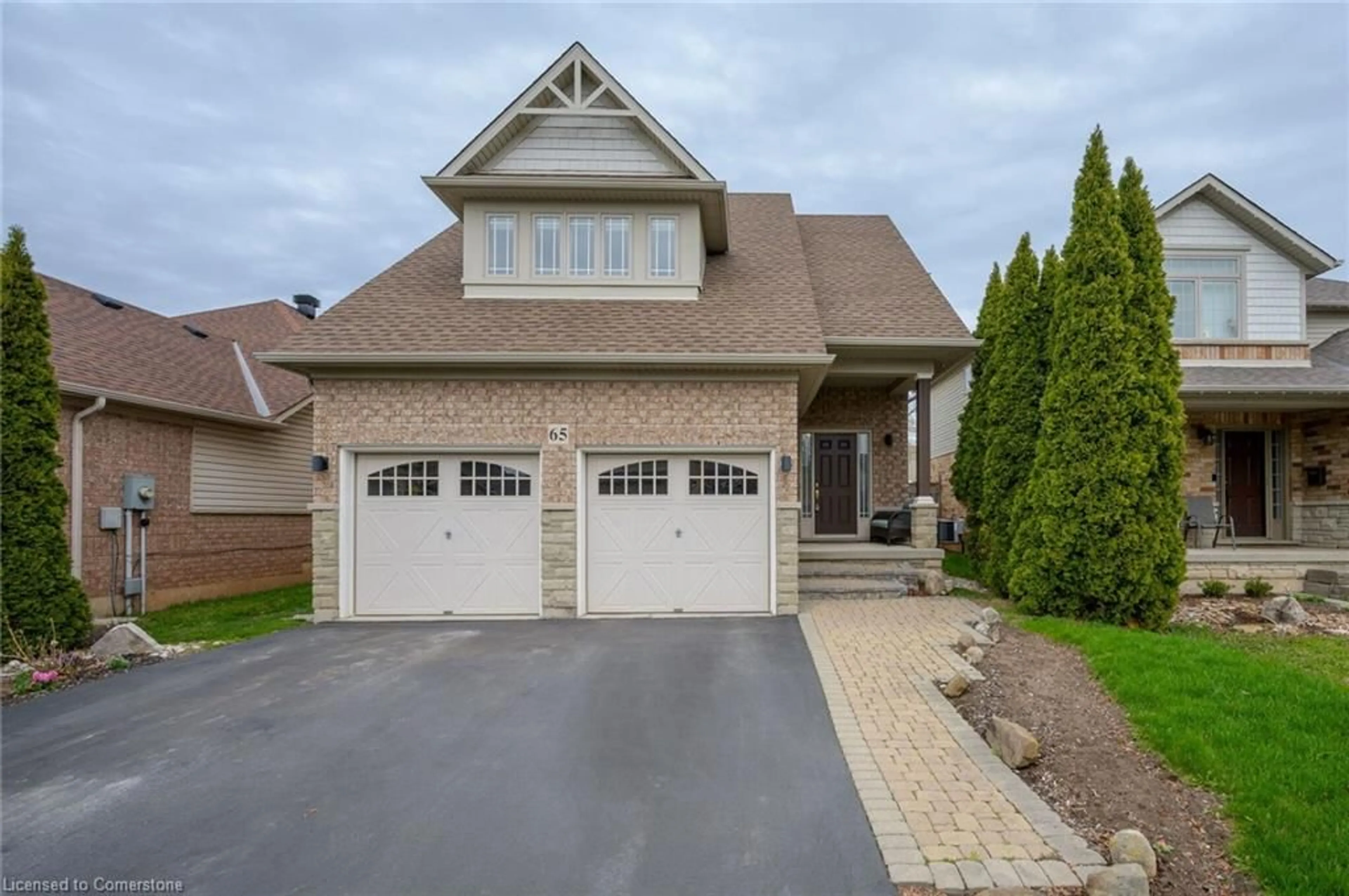 Home with brick exterior material, street for 65 Plum Tree Lane, Grimsby Ontario L3M 5T6