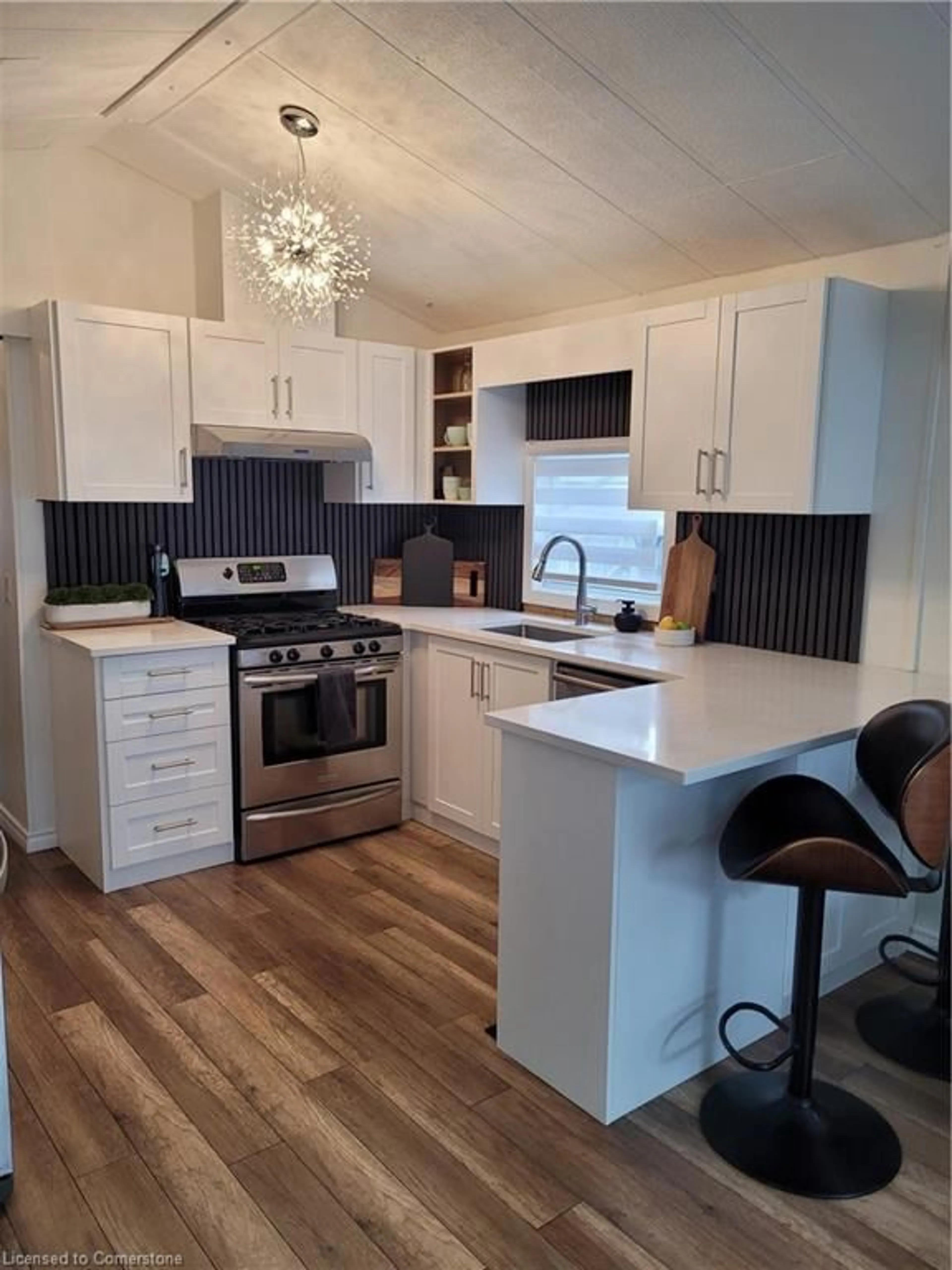 Open concept kitchen, wood/laminate floor for 580 Beaver Creek Rd #356, Waterloo Ontario N2J 3Z4