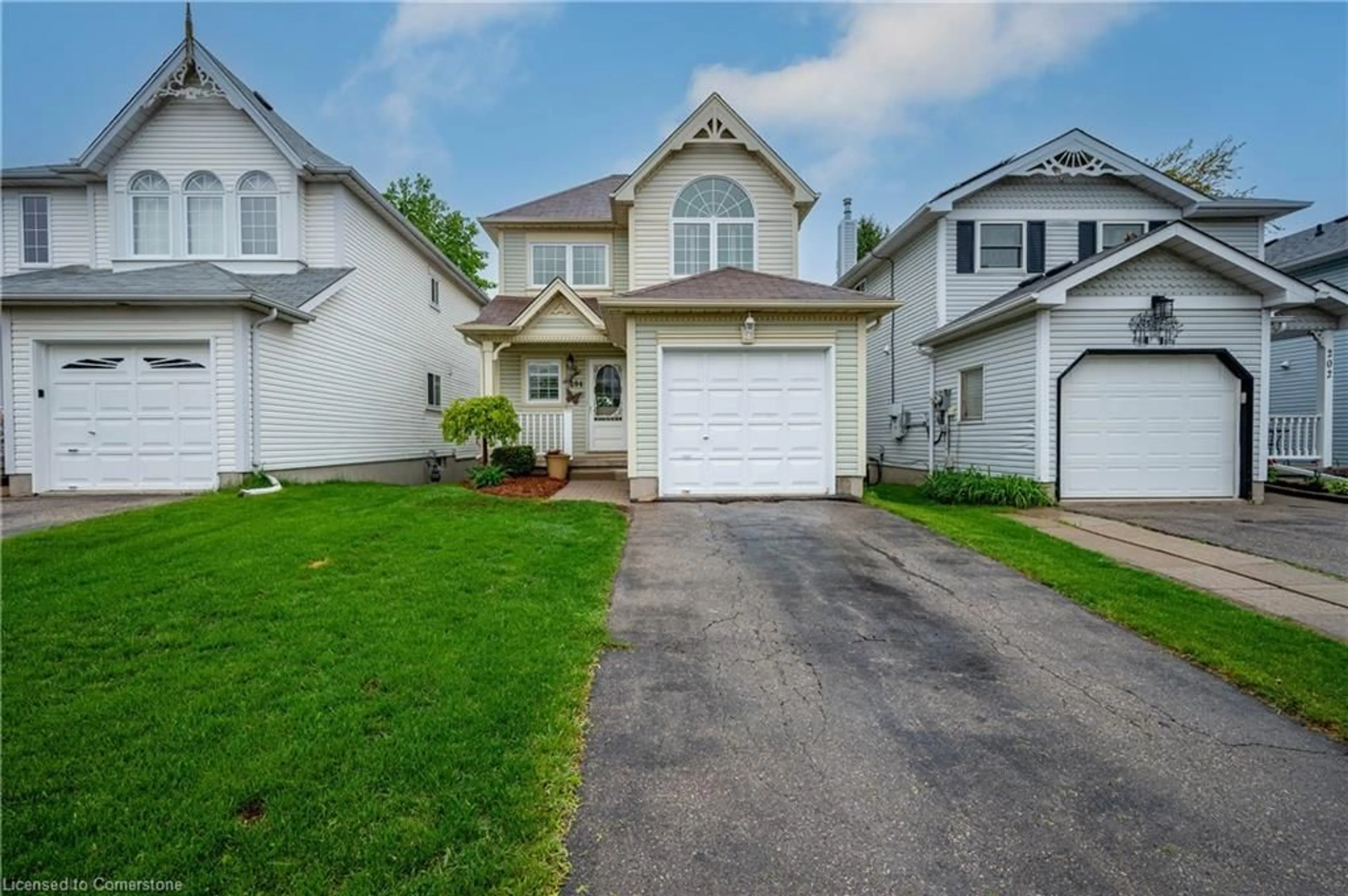 Home with vinyl exterior material, street for 204 Auburn Dr, Waterloo Ontario N2K 3T2